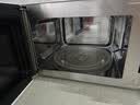海尔（Haier）0涂层不锈钢快捷微波炉 360°转盘加热 旋转操作易洁内胆 家用小型 老人适用 HW-M2003JW 厨房电器 实拍图
