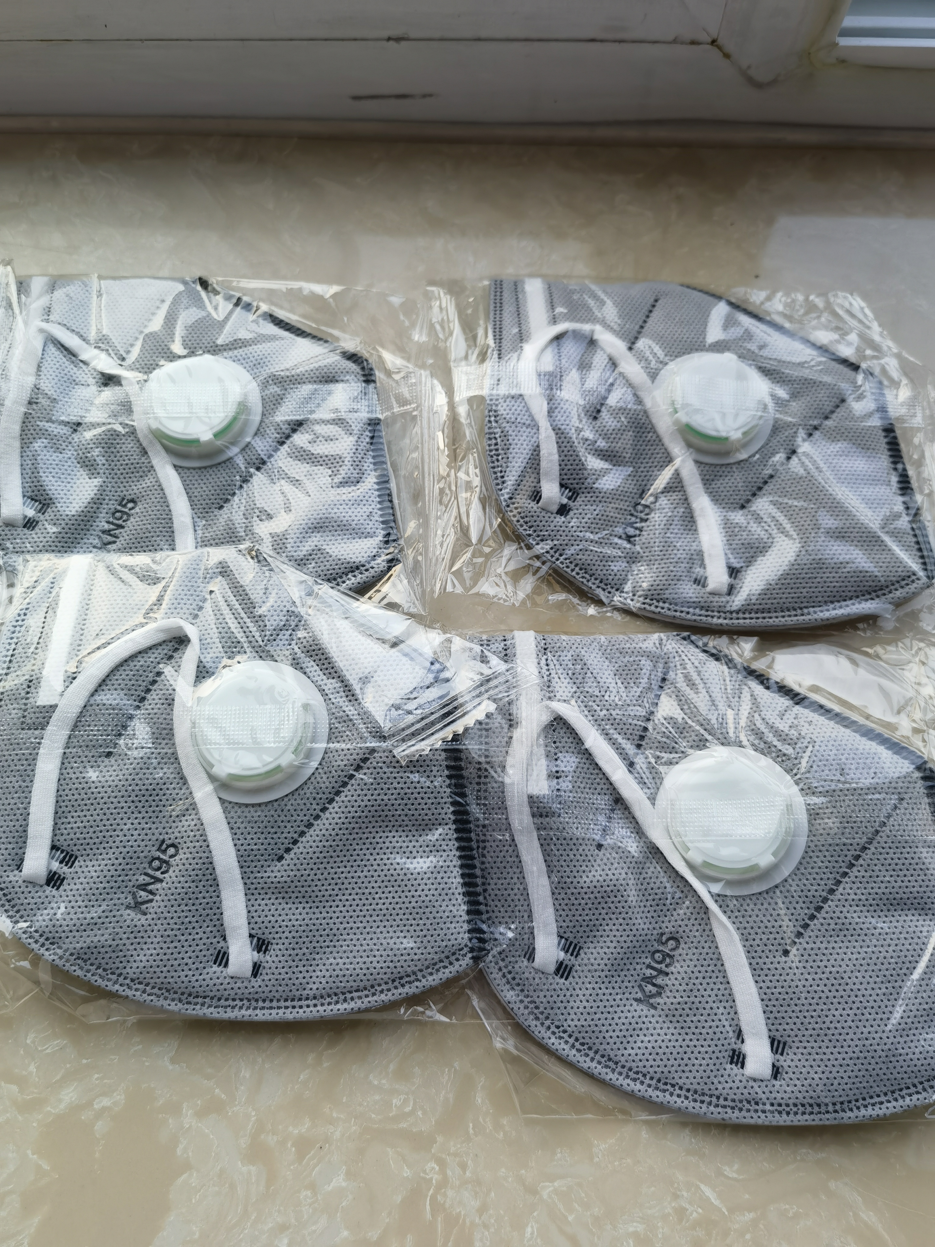 袋鼠医生KN95口罩工业防尘一次性打磨电焊八层带呼吸阀活性炭50只独立包装 实拍图