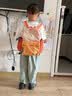 SHUKIKU儿童书包1-3年级小学生超轻防泼水透气背包户外旅游 橘子汽水M码 实拍图
