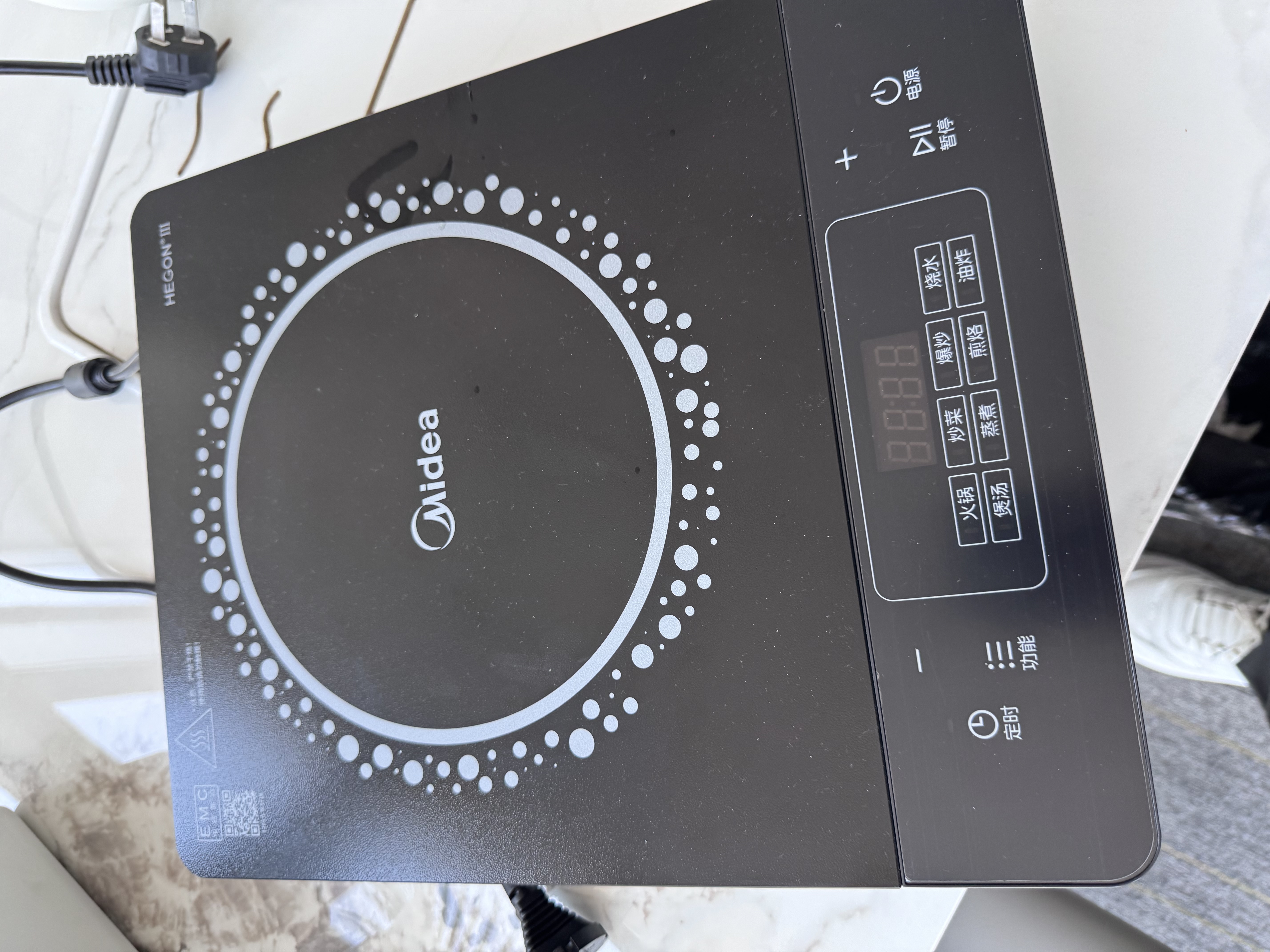 美的（Midea）电磁炉 2200W大功率家用猛火爆炒耐用面板炒菜蒸煮八档火力纤薄电磁灶火锅炉 C22-RT22E01 实拍图
