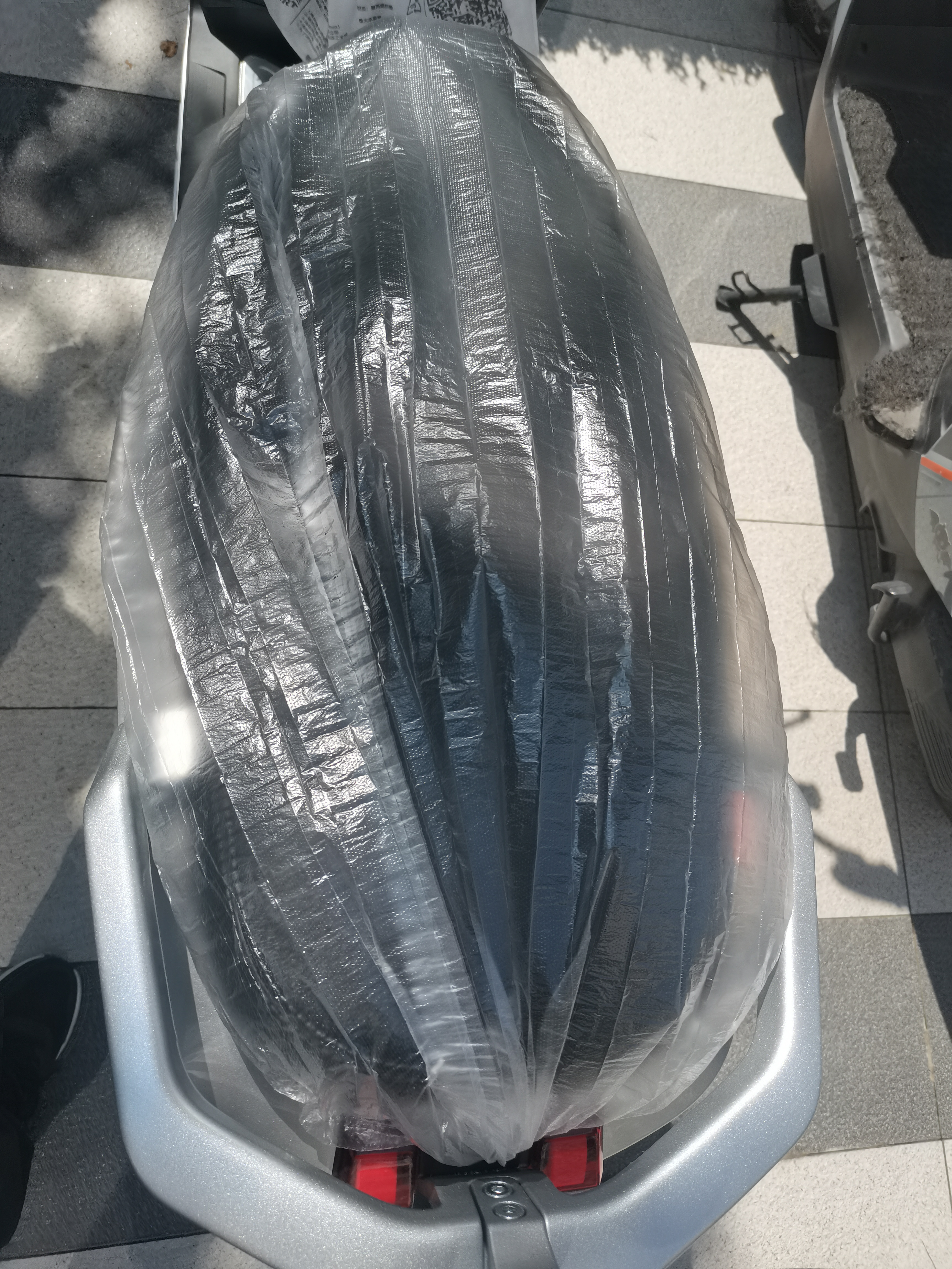 博沃尼克电动车防雨保护罩一次性透明坐垫套防尘防水雪摩托车自行车50只装 实拍图