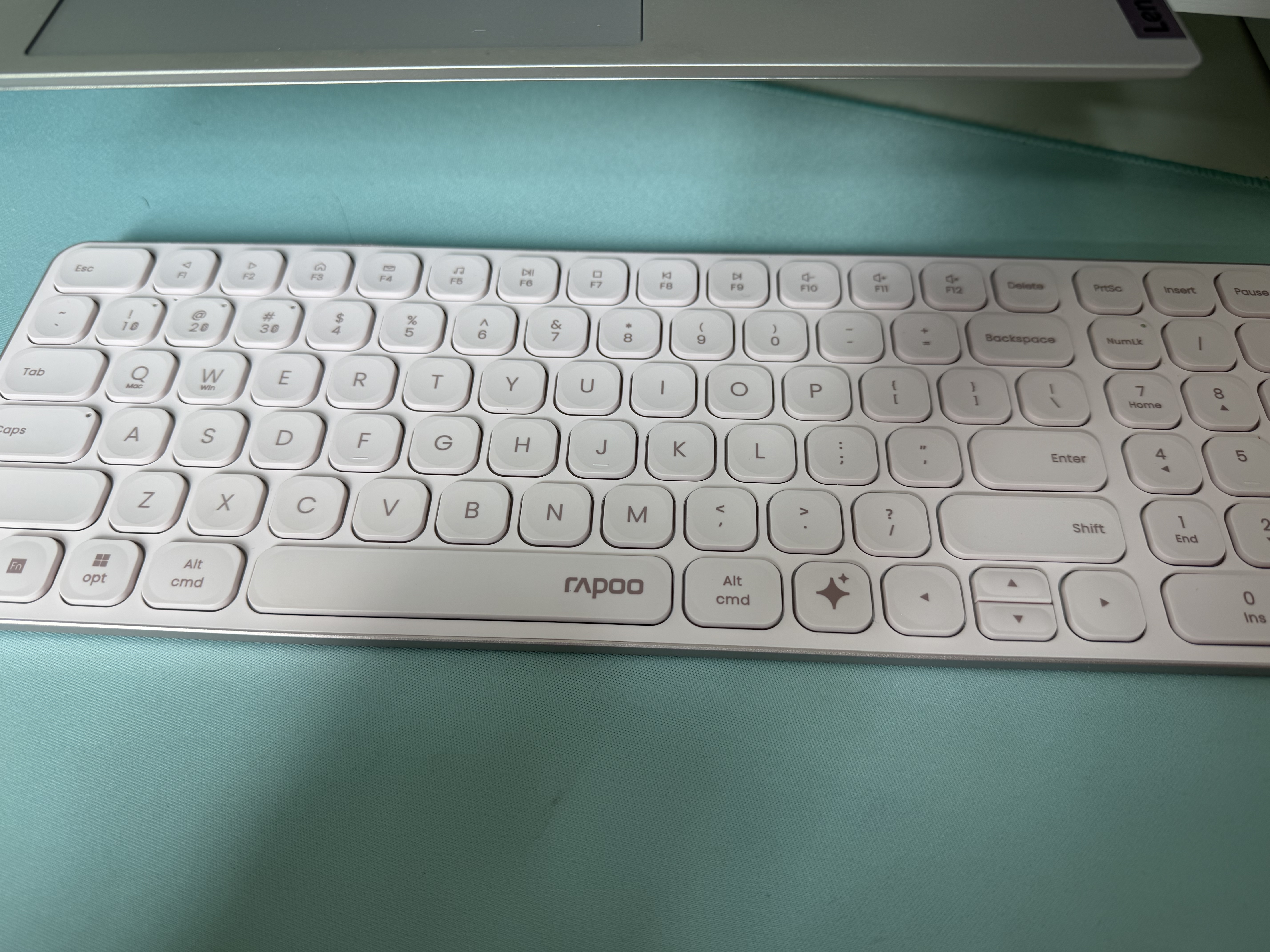 雷柏（Rapoo）E9350L AI版 99键无线/蓝牙多模充电键盘 刀锋超薄便携紧凑无线办公键盘 一键直达DeepSeek 樱粉 实拍图