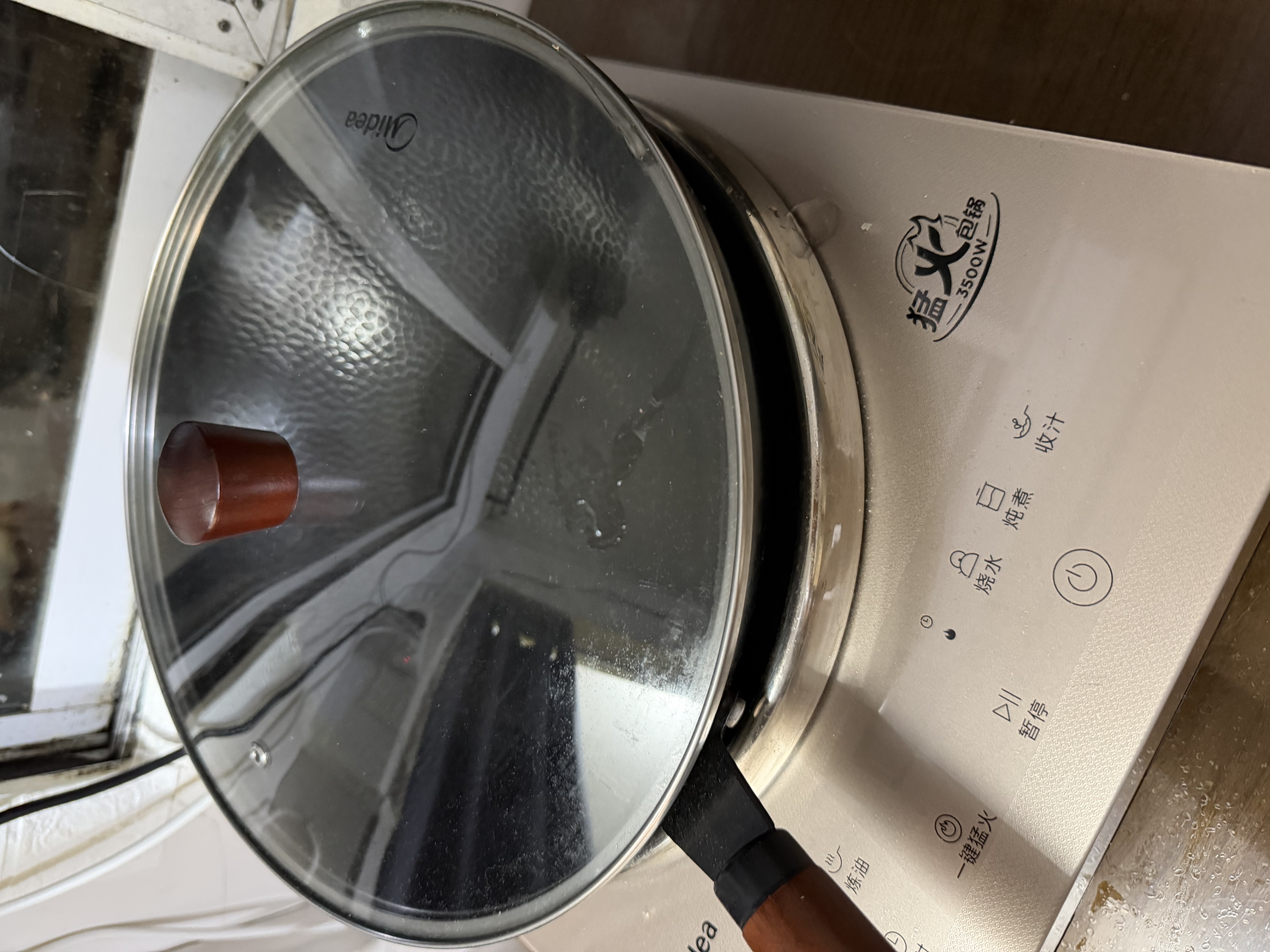 美的（Midea）铁锅炒锅健康无涂层精铁炒菜锅家用明火燃气灶凹面电磁炉专用32cm 实拍图