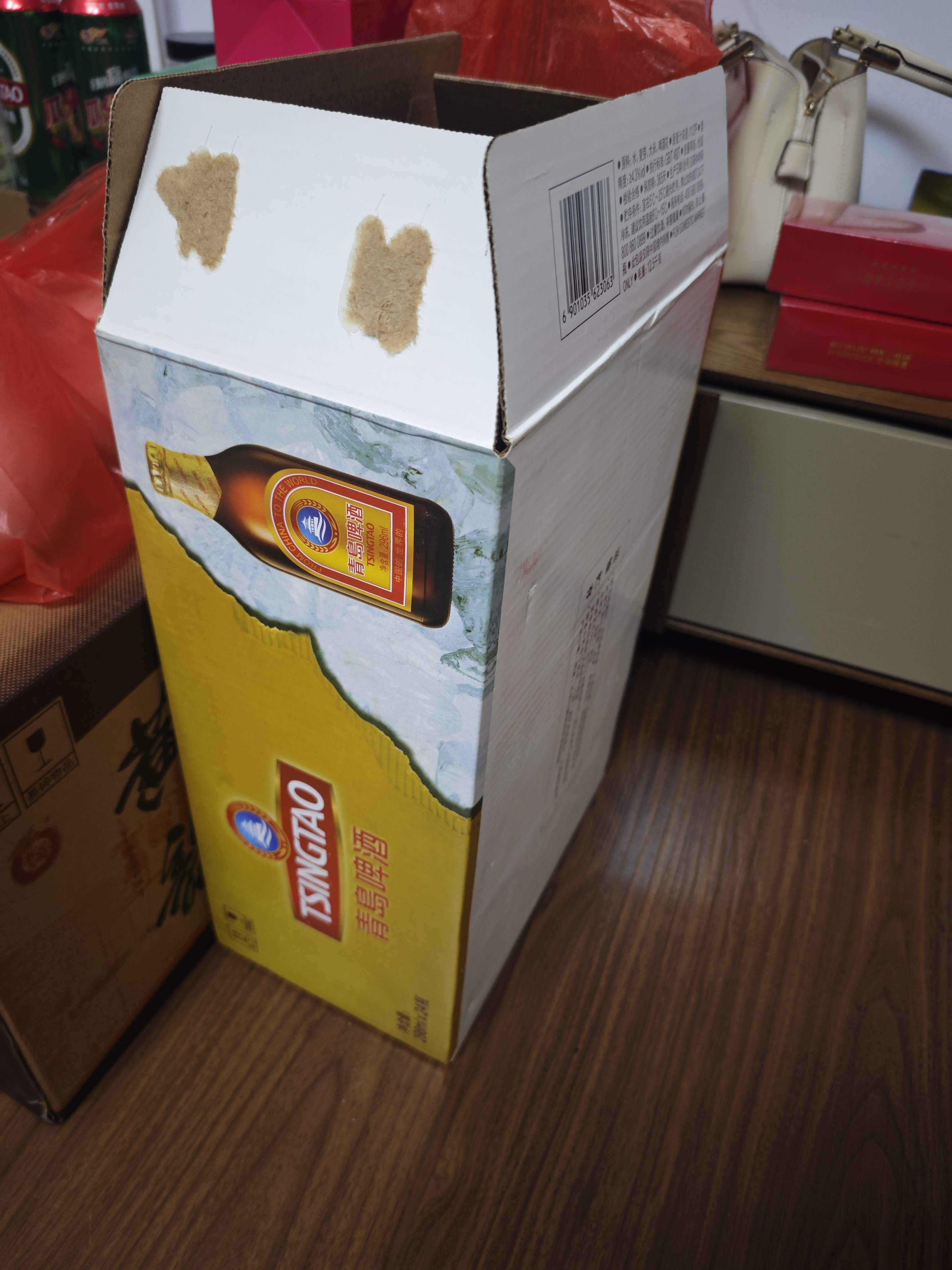 青岛啤酒（TsingTao）金质小棕金 低温酿造 296ml*24瓶 整箱装 实拍图