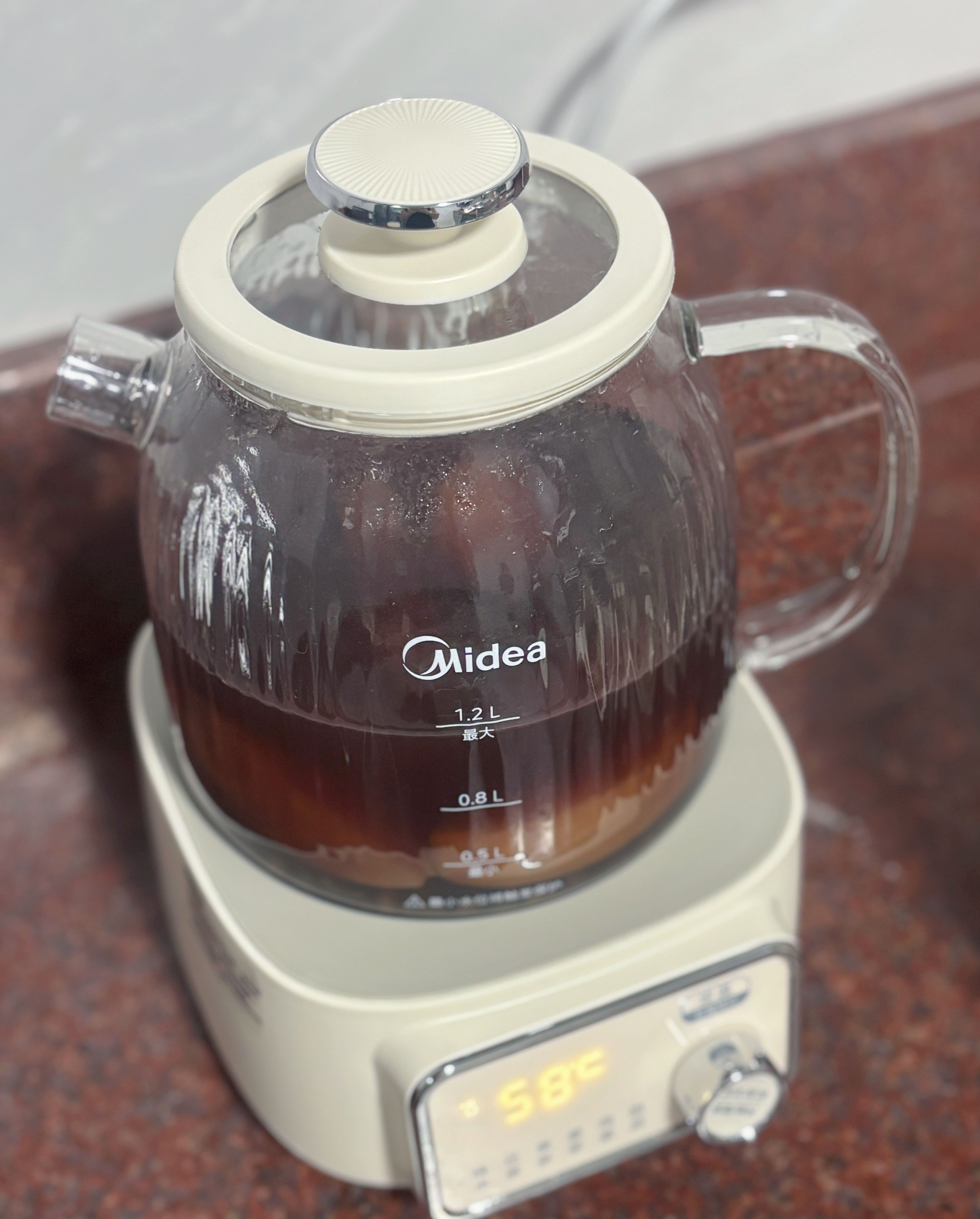 美的（Midea）花漾0胶水全玻璃养生壶多功能煮茶壶母婴烧水壶调奶器智能恒温电热水壶全自动一体1.2L YS12B302J 实拍图