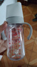 爱得利（evorie）婴儿奶瓶 宽口径带手柄重力球Tritan奶瓶240ml 灰(6个月+) 实拍图