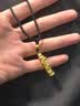中国黄金（CHINA GOLD）足金神龙盘柱吊坠男女款黄金本命年生肖龙项链送新年生日礼物 神龙盘柱+福字珠【黑绳】约1.6g 实拍图