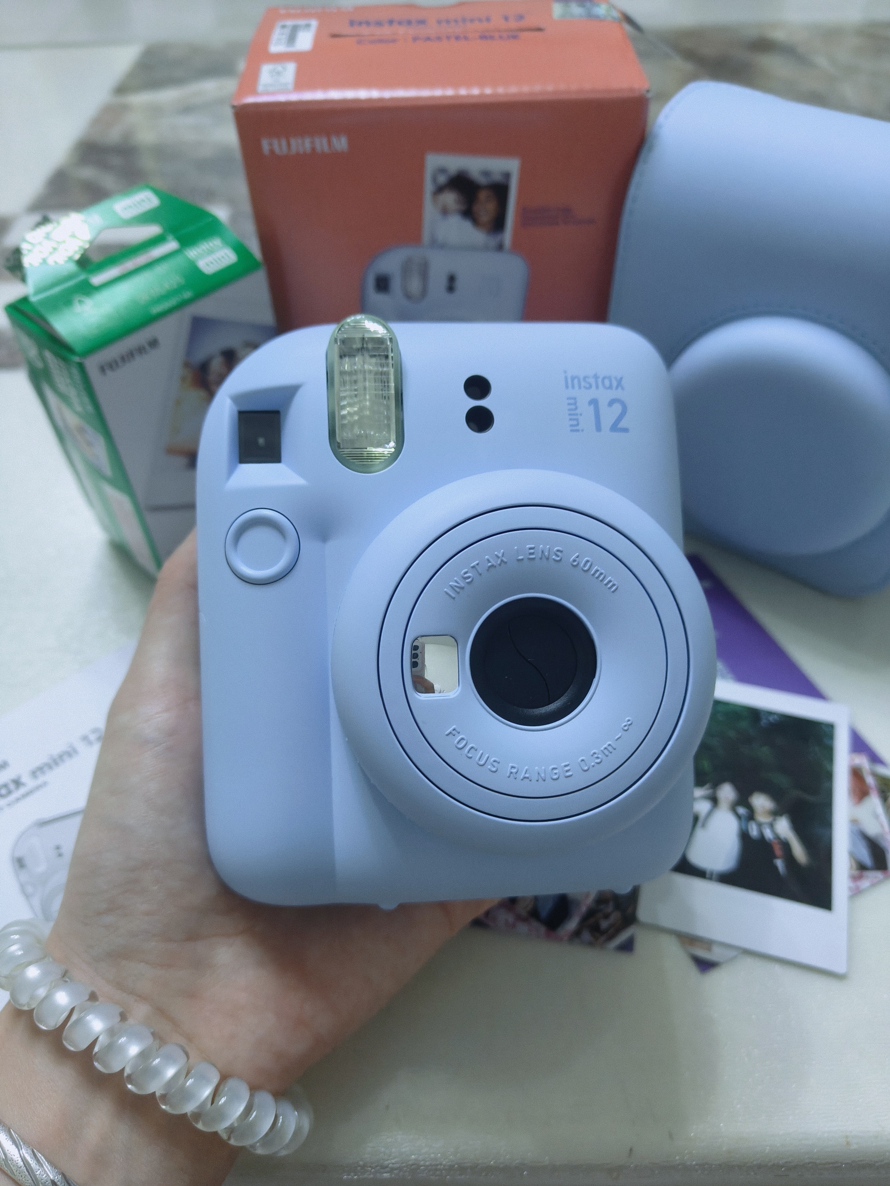 富士（FUJIFILM）instax  mini12 一次成像 立拍立得相机 mini12 绣球蓝 套餐八（官方标配+相机包+相册+白边相纸20张） 实拍图