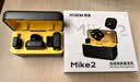 西圣（XISEM）Mike2新升级无线麦克风夹领式一拖二直播设备降噪拍视频录音专用收音纽扣式领夹麦克风 Mike2 安卓苹果通用【一拖二配充电仓】黑色 实拍图
