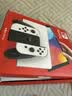 任天堂（Nintendo）【国内保税仓】Switch2/1代 OLED/续航加强日版/港版便携家用ns体感游戏机掌机 日版OLED白色+双人成行+Pro黑色手柄 实拍图
