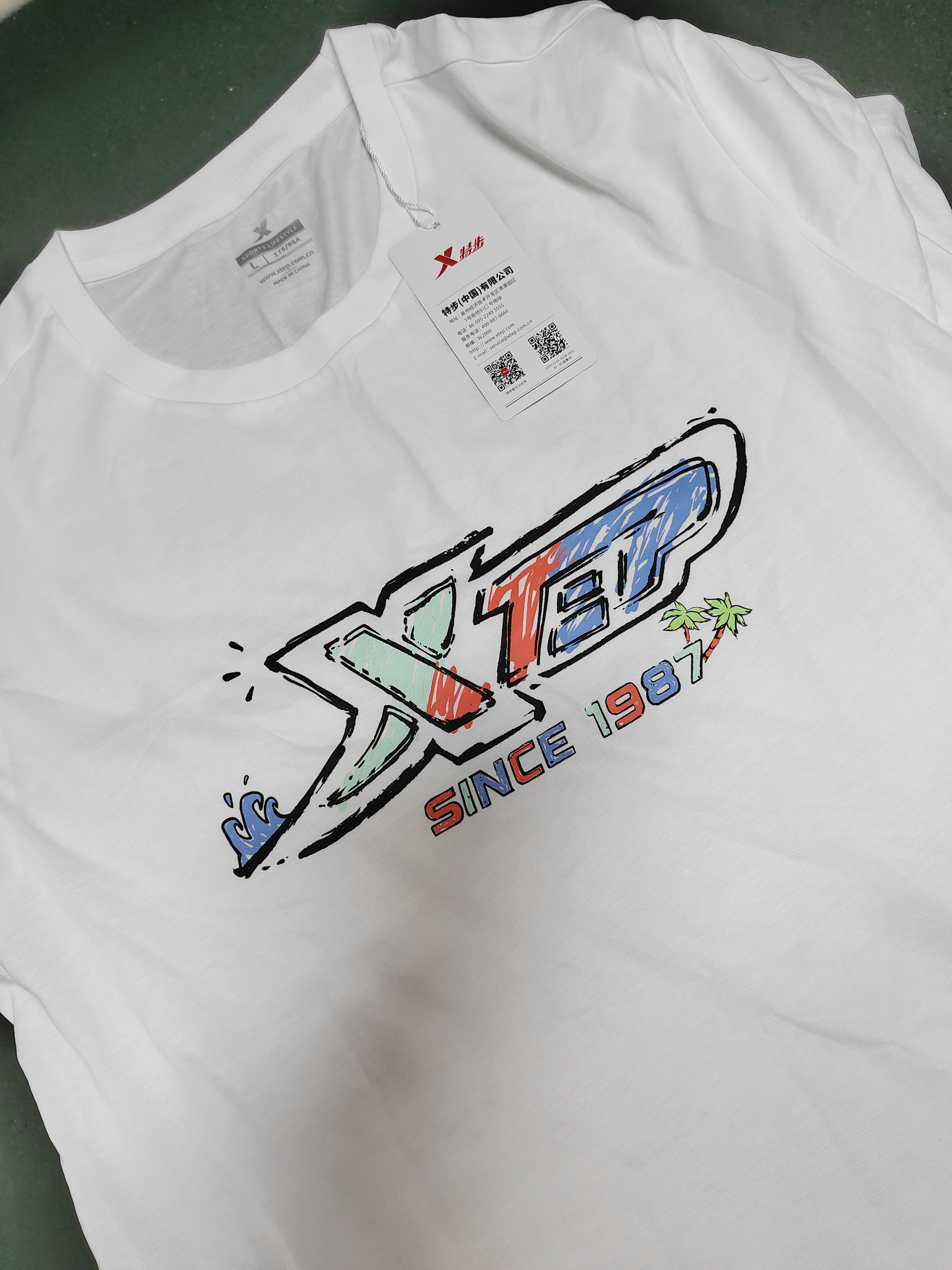 特步短袖男女2026年新款夏季情侣半袖运动衣服休闲圆领吸汗棉t恤衫 本白 L 实拍图