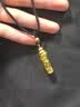 中国黄金（CHINA GOLD）足金神龙盘柱吊坠男女款黄金本命年生肖龙项链送新年生日礼物 神龙盘柱+福字珠【黑绳】约1.6g 实拍图