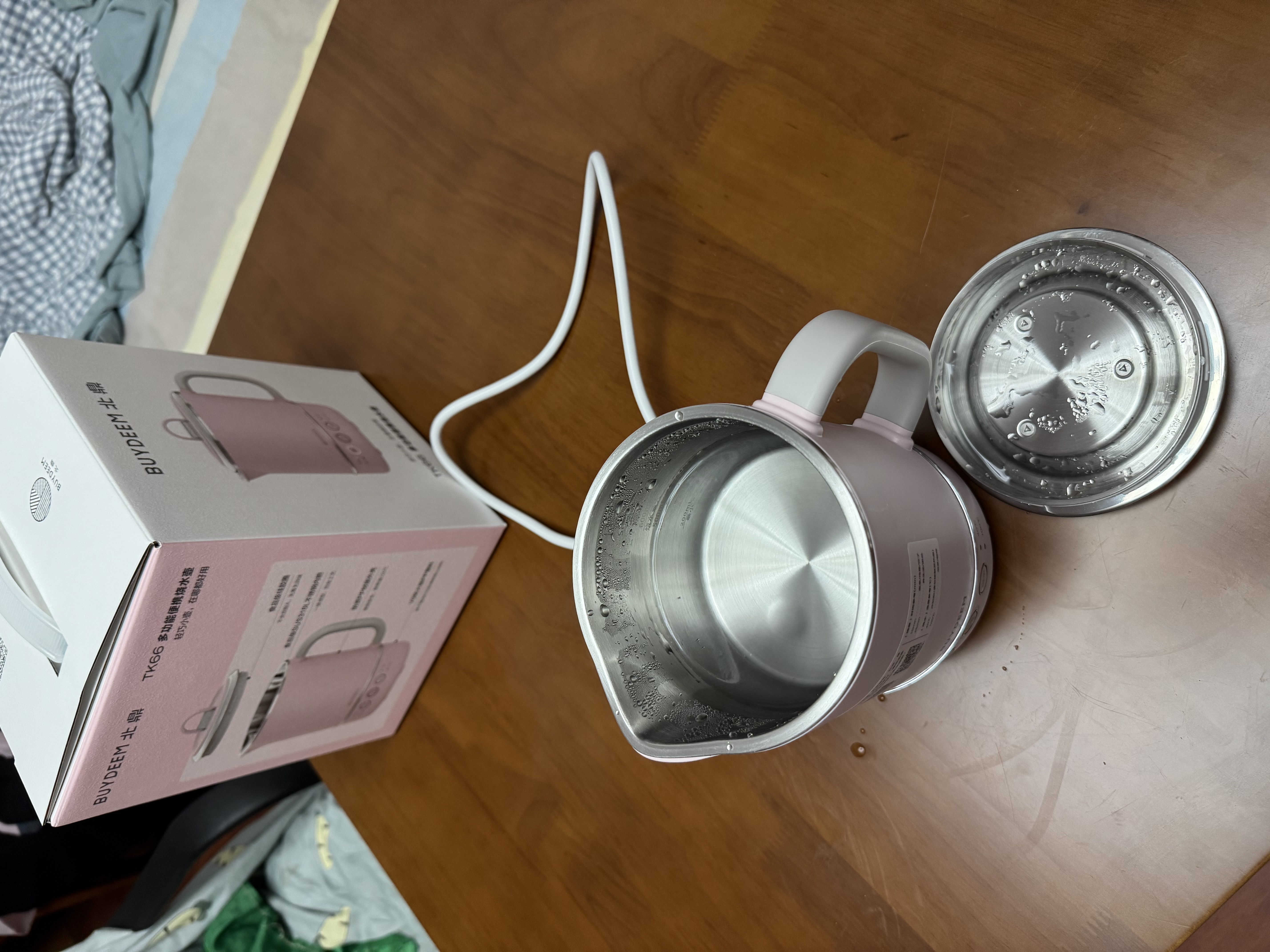 北鼎（Buydeem）宿舍多功能便携式烧水壶 出差旅行必备小型电热水壶 全球可用电水壶 全自动精煮恒温水壶 0.6L 【升级款-猪猪粉】便携式烧水壶TK66 实拍图