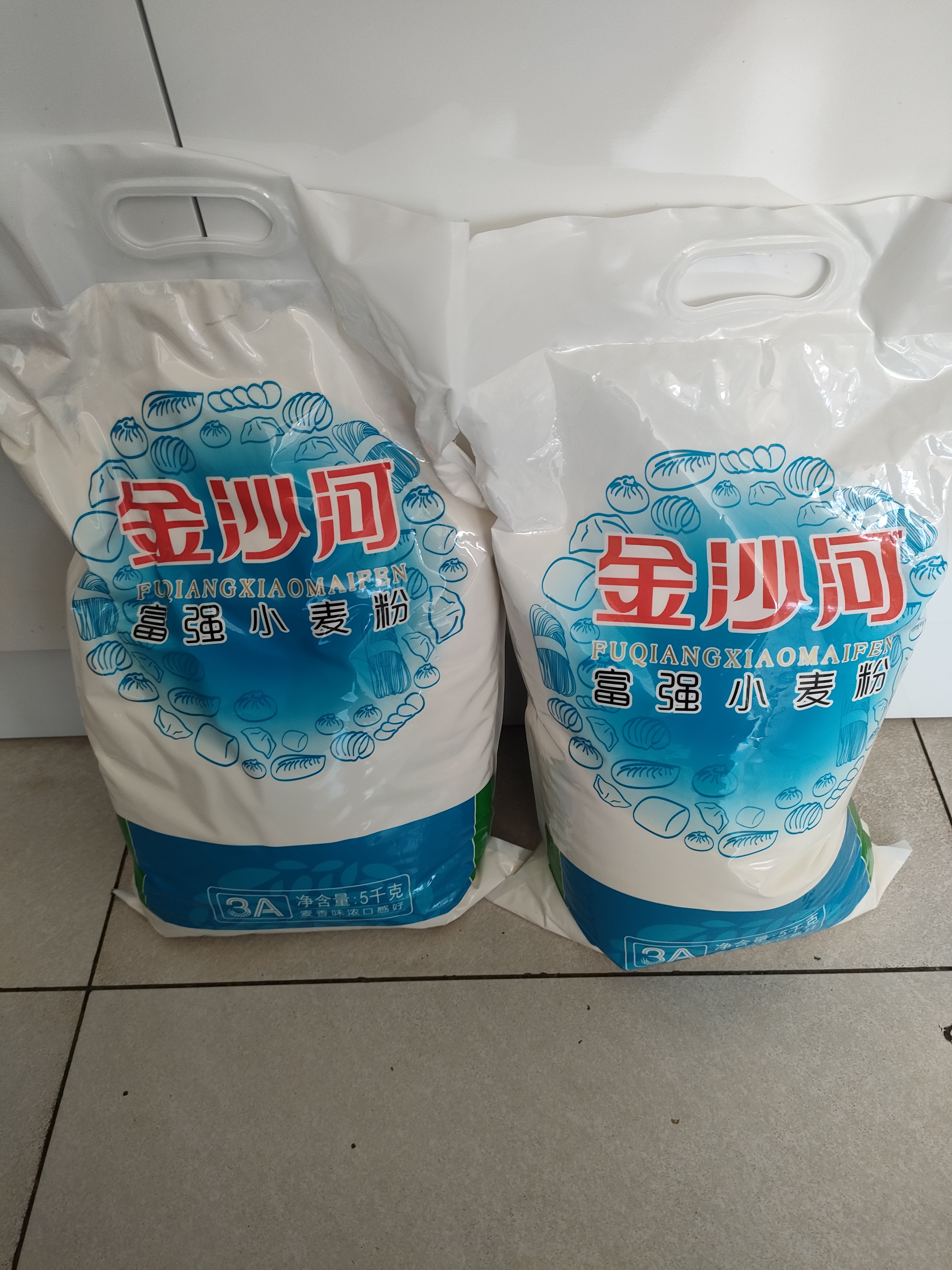 金沙河面粉 富强小麦粉50斤 包子馒头水饺手擀面烘焙白面 家用10斤*5包 实拍图