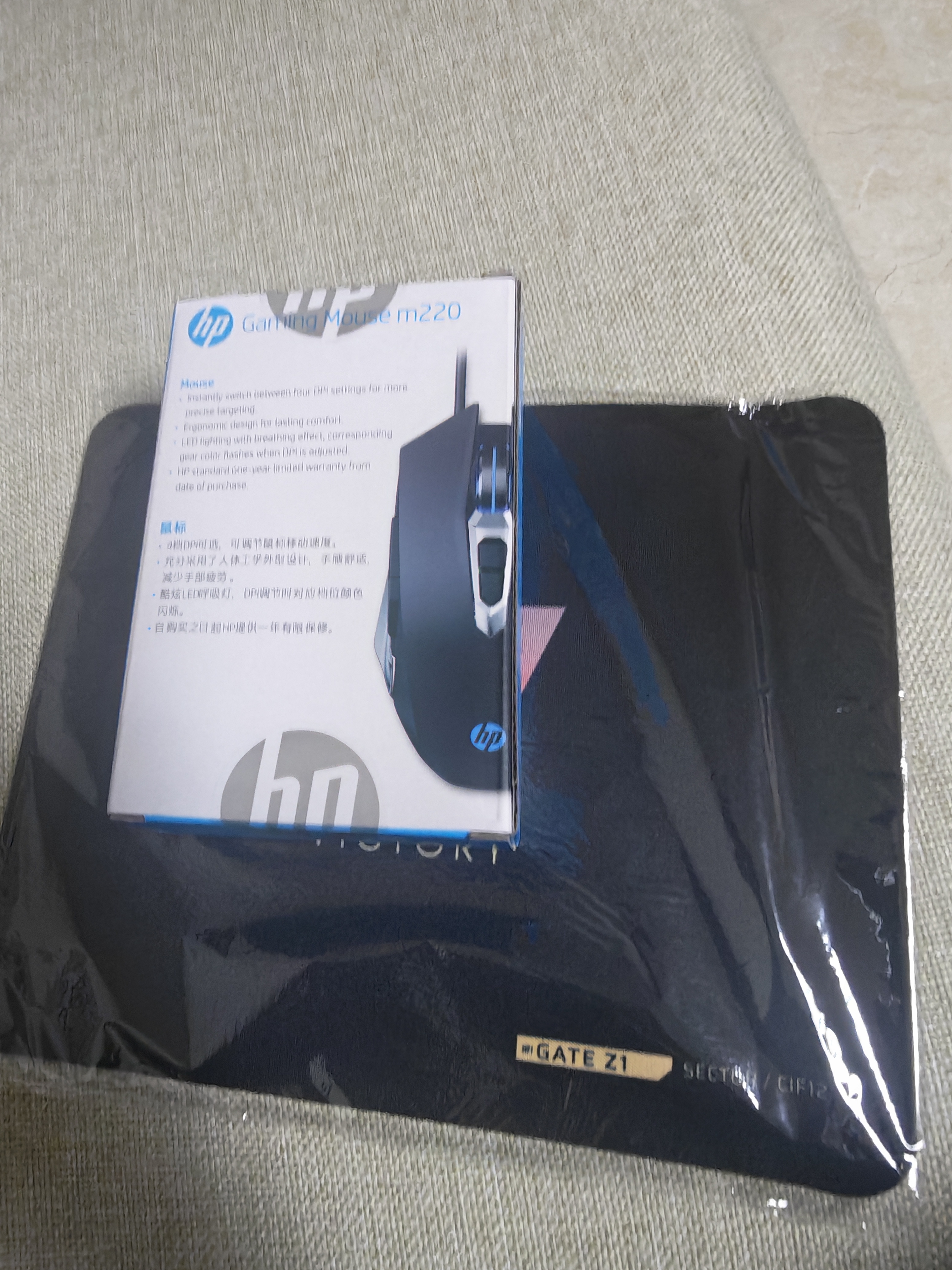 惠普（HP）M220游戏鼠标USB有线鼠标自定义宏驱动2400DPI吃鸡LOL鼠标电竞游戏鼠标 奶茶色 暖橙光 有声版 实拍图