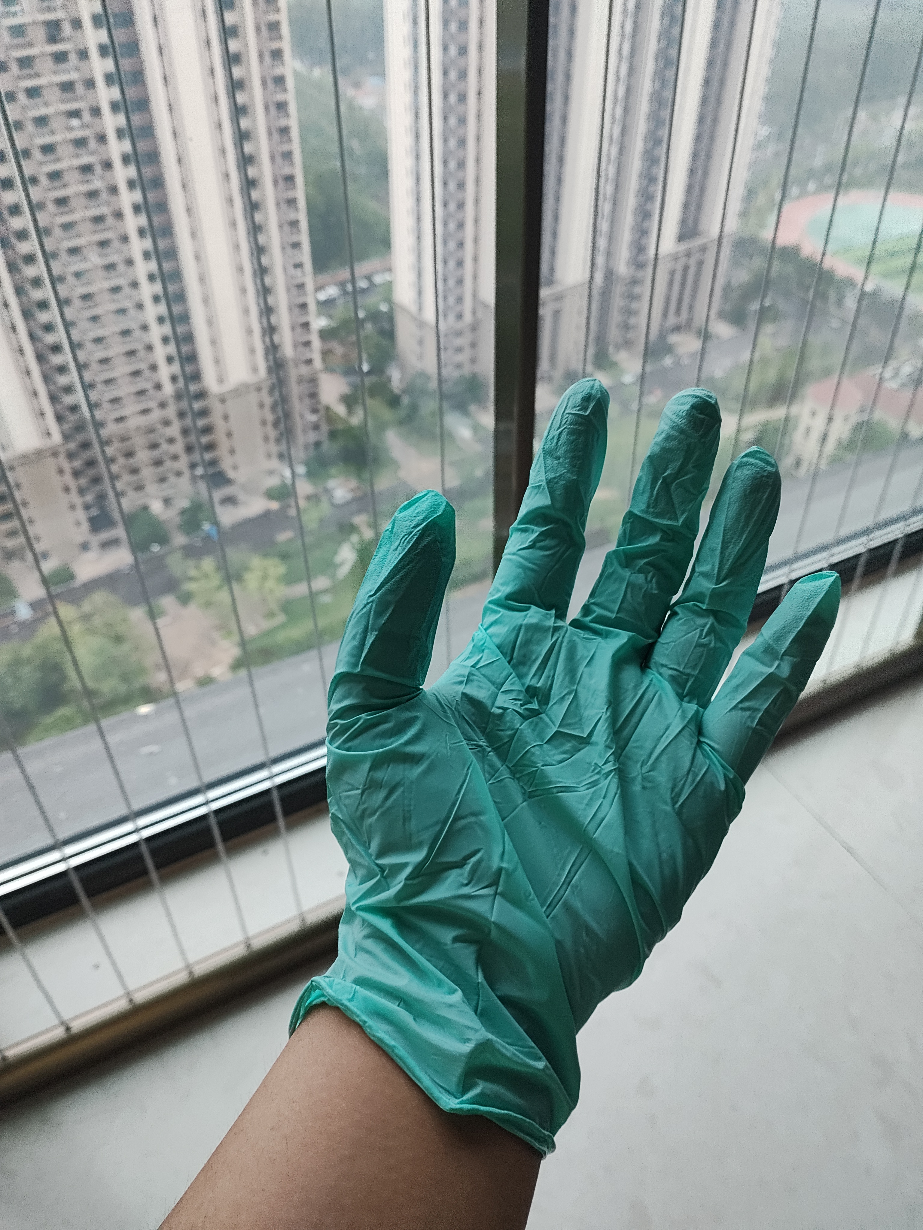 蓝帆医疗（blue sail+）聚氨酯空气手套超薄一次性无粉母婴洗碗宠物清洁手套50只/盒M码 实拍图