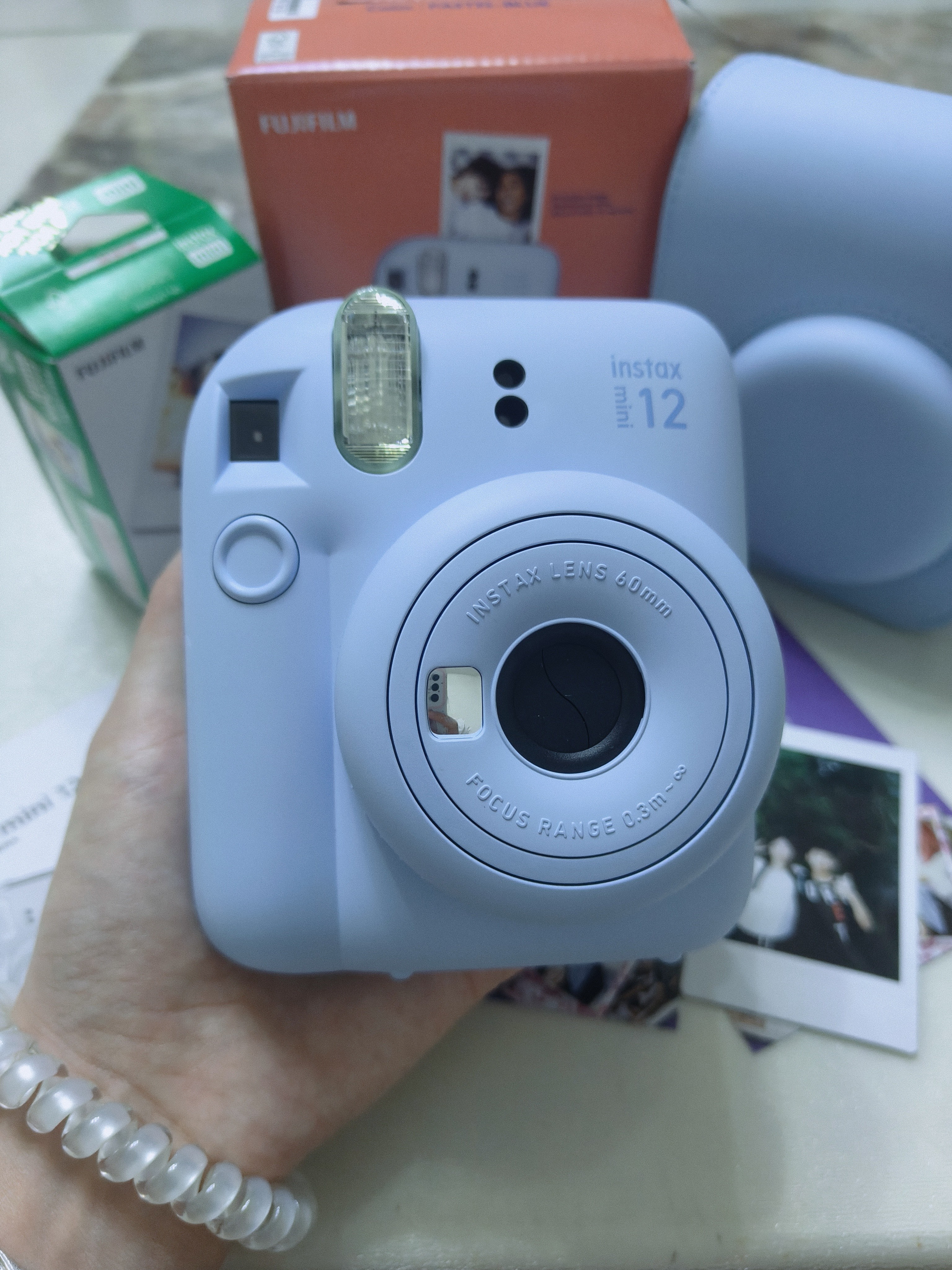 富士（FUJIFILM）instax  mini12 一次成像 立拍立得相机 mini12 绣球蓝 套餐八（官方标配+相机包+相册+白边相纸20张） 实拍图