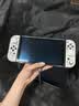 任天堂（Nintendo）【国内保税仓】Switch2/1代 OLED日版/港版游戏机续航加强版ns体感掌机便携家用主机 OLED日版白色64GB（赠2年共享会员）保税仓 实拍图