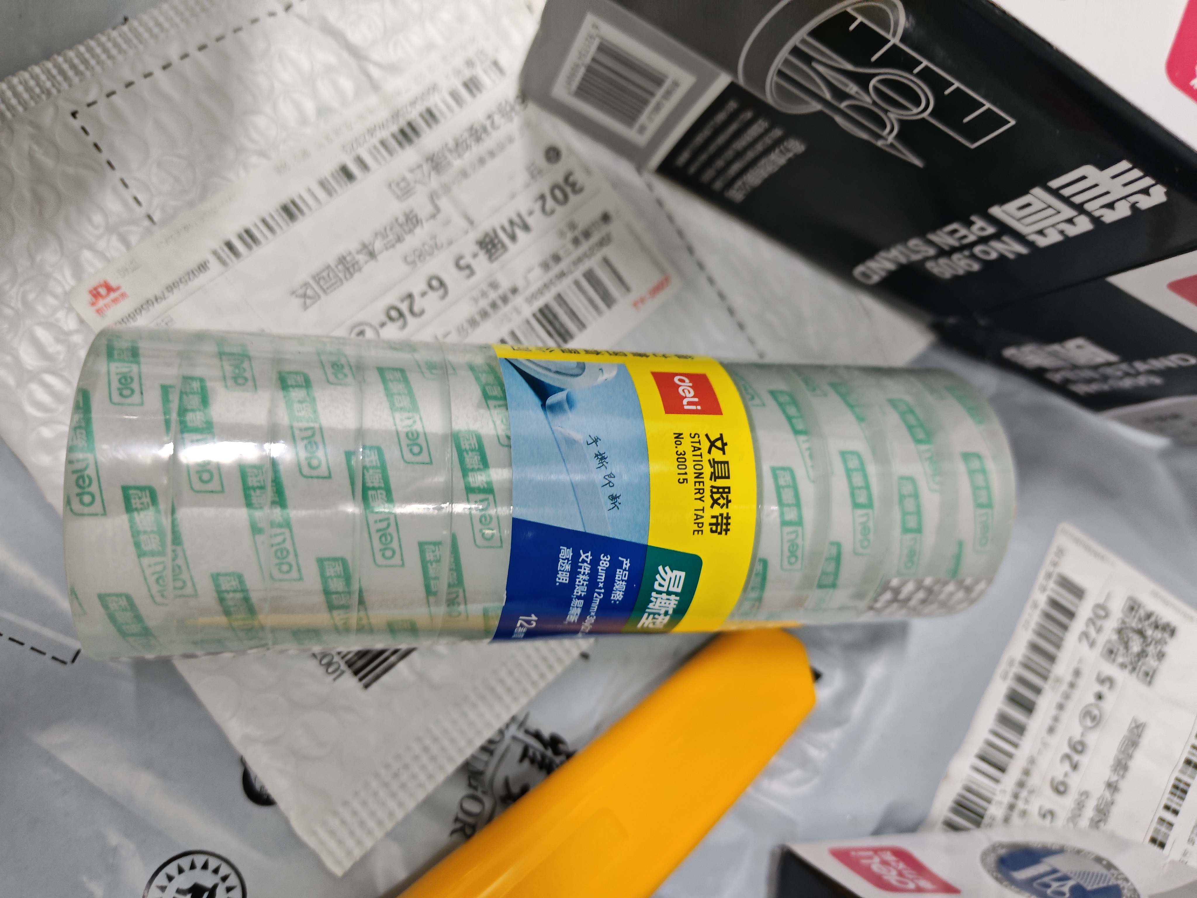 得力（deli）易撕透明胶带 12mm*30y高粘小胶带 开学必备学习用品 错题整理学生文具 12卷/筒 办公用品 30015 实拍图