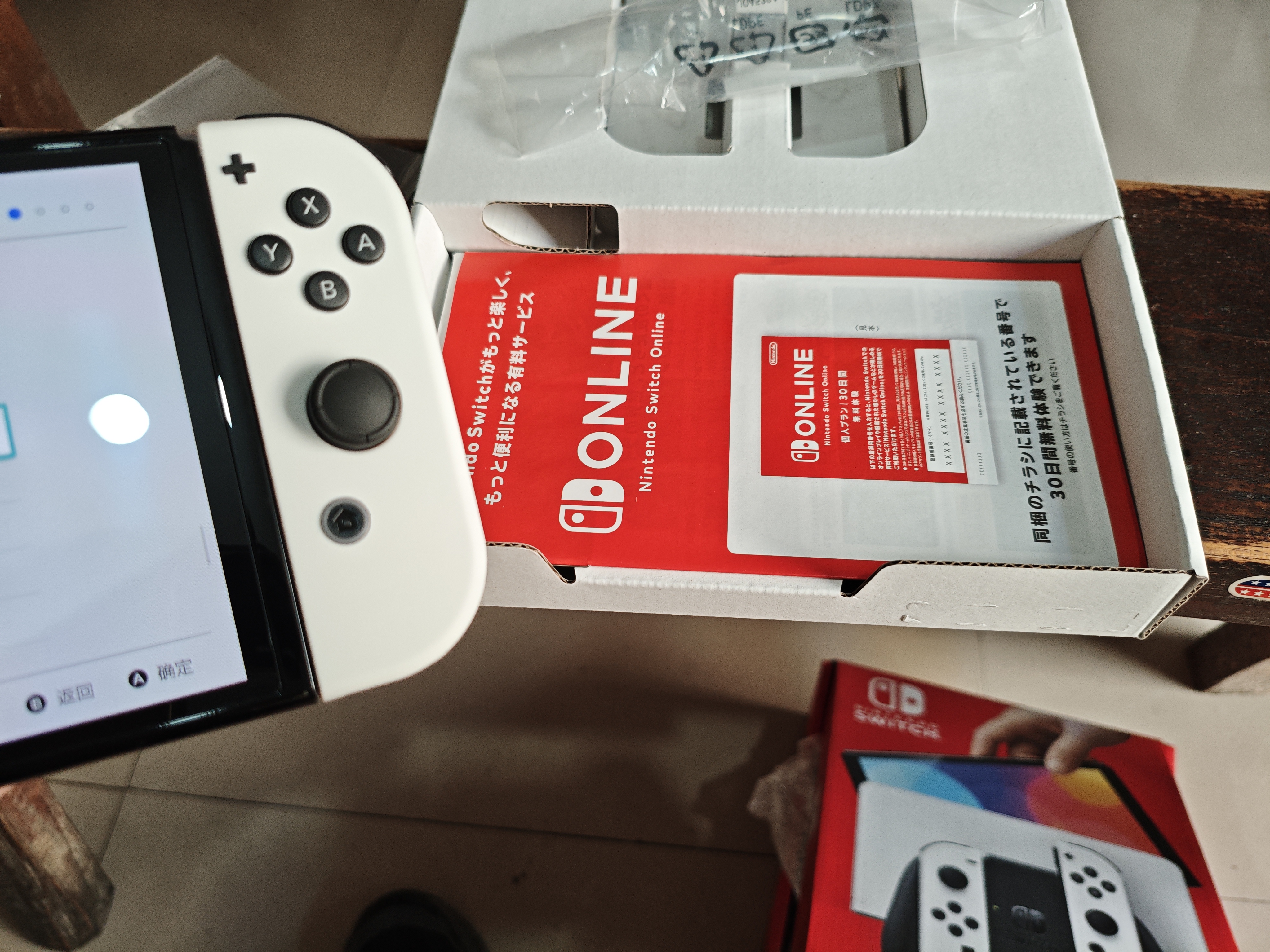任天堂（Nintendo）【国内保税仓】Switch2/1代 OLED/续航加强日版/港版便携家用ns体感游戏机掌机 日版OLED白色+宝可梦紫 实拍图