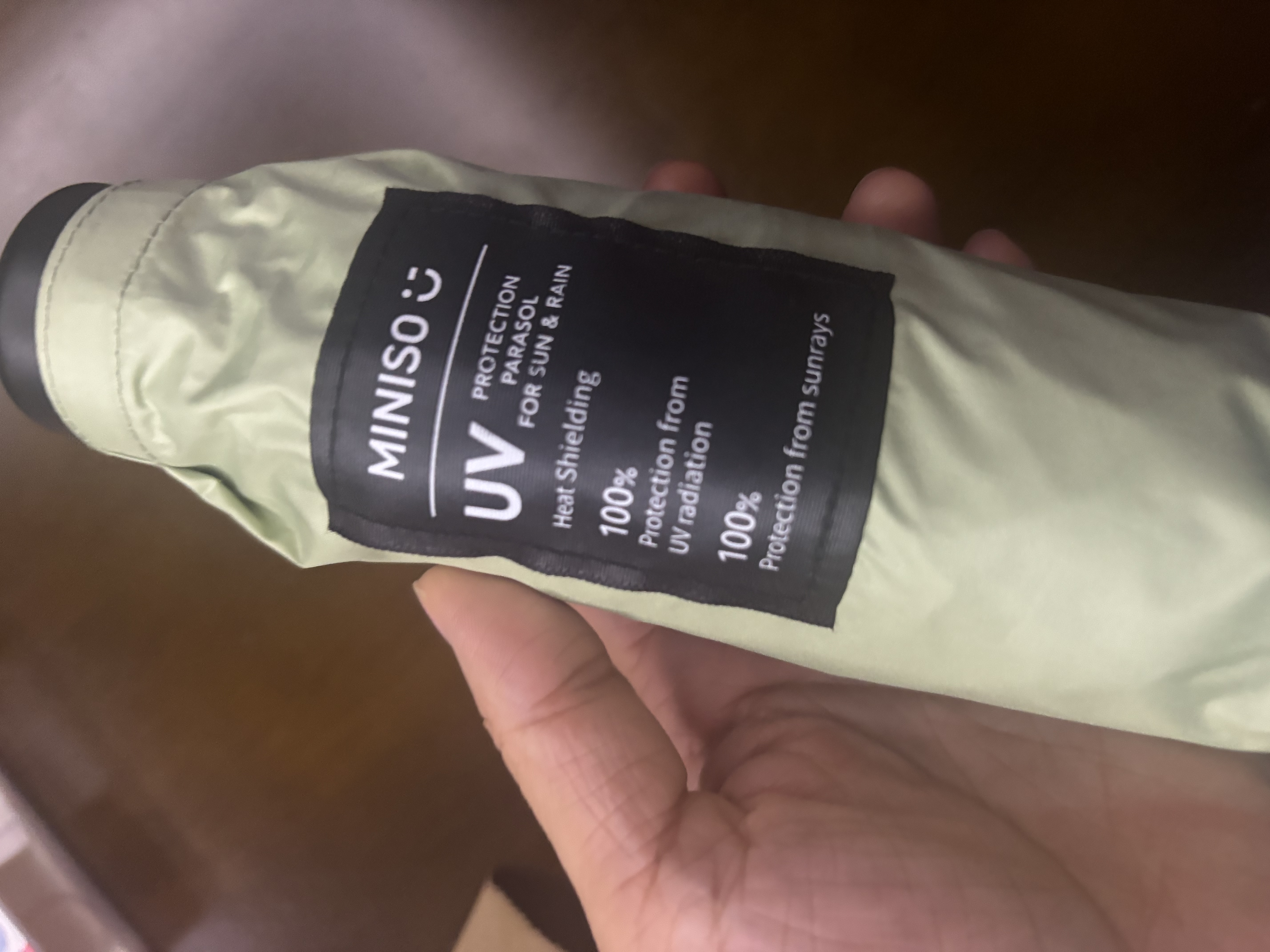 名创优品（MINISO）防晒伞口袋系列超细便捷五折防晒伞遮阳伞小巧便携晴雨伞(浅绿) 实拍图