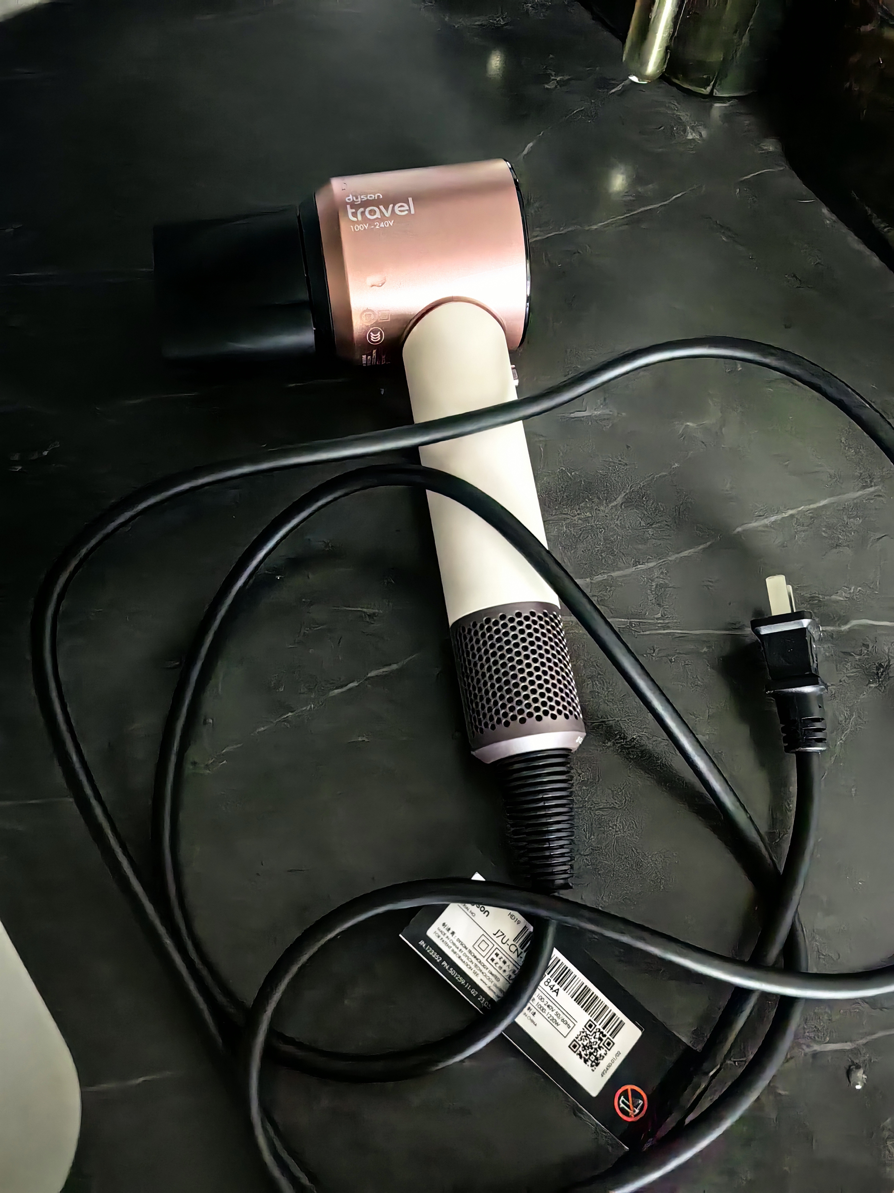 戴森（DYSON）HD19 travel随行吹风机 电吹风 更小更轻 快速干发 智能温控 旅行 全球通用电压 单风嘴 晨曦粉色 实拍图