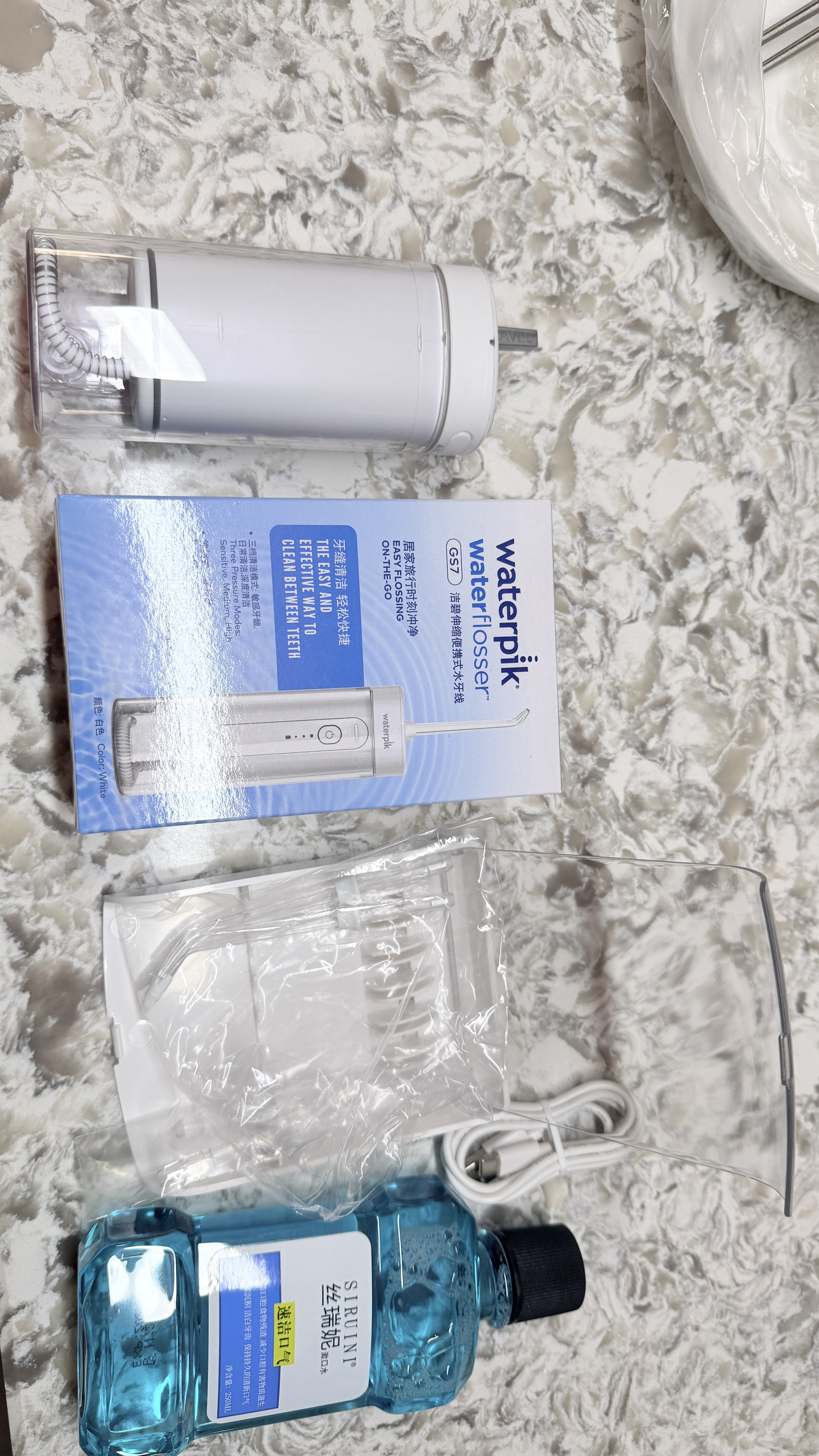洁碧（Waterpik）冲牙器水牙线GS7-1伸缩便携式电动洁牙机手持式洗牙器家用立式全身水洗 送男女朋友教师节礼物 GS7珍珠白【伸缩便携款】 实拍图