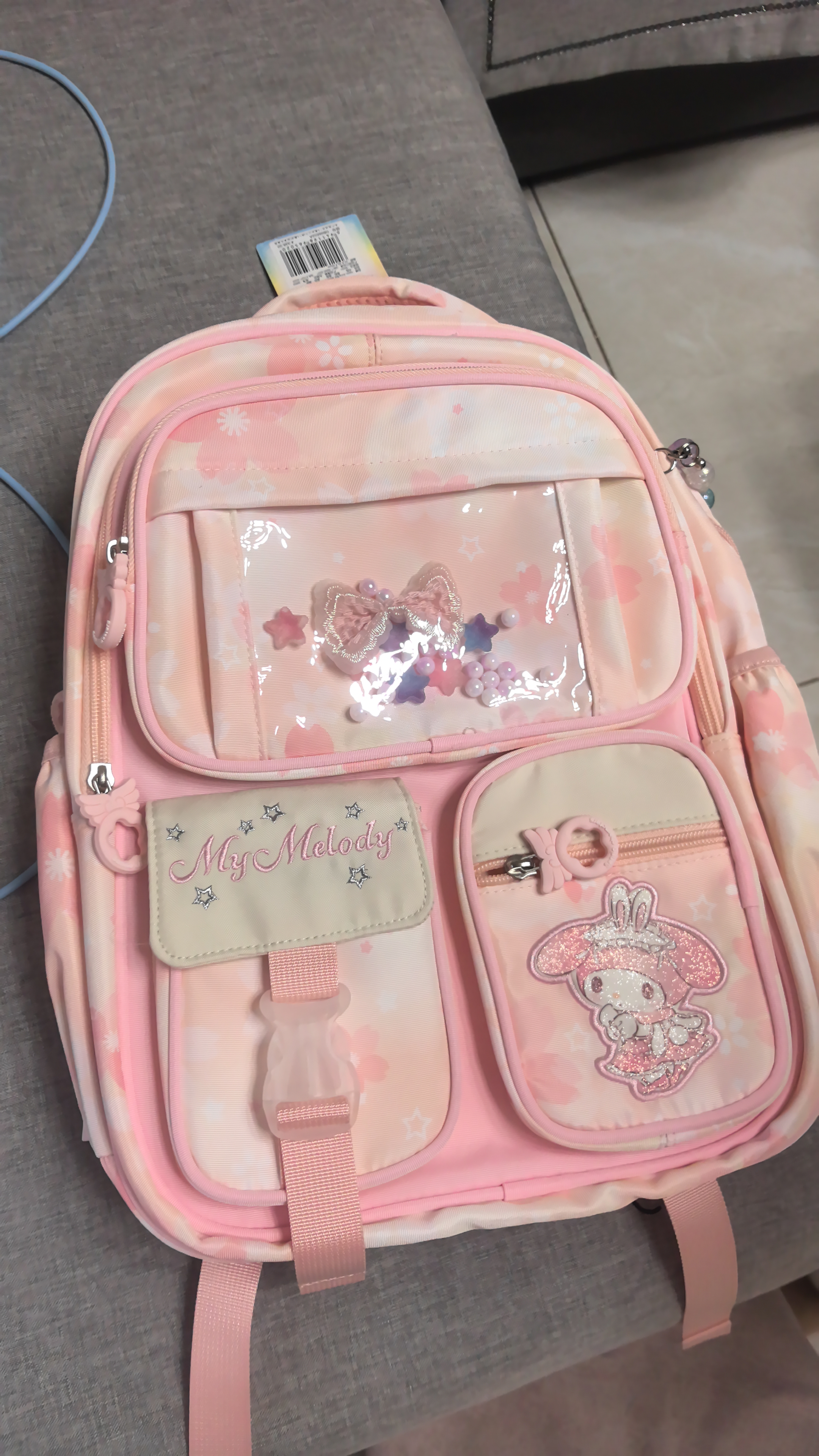 Hello Kitty小学生书包女生三二一年级女童护脊减负儿童双肩包96652A美乐蒂粉 实拍图