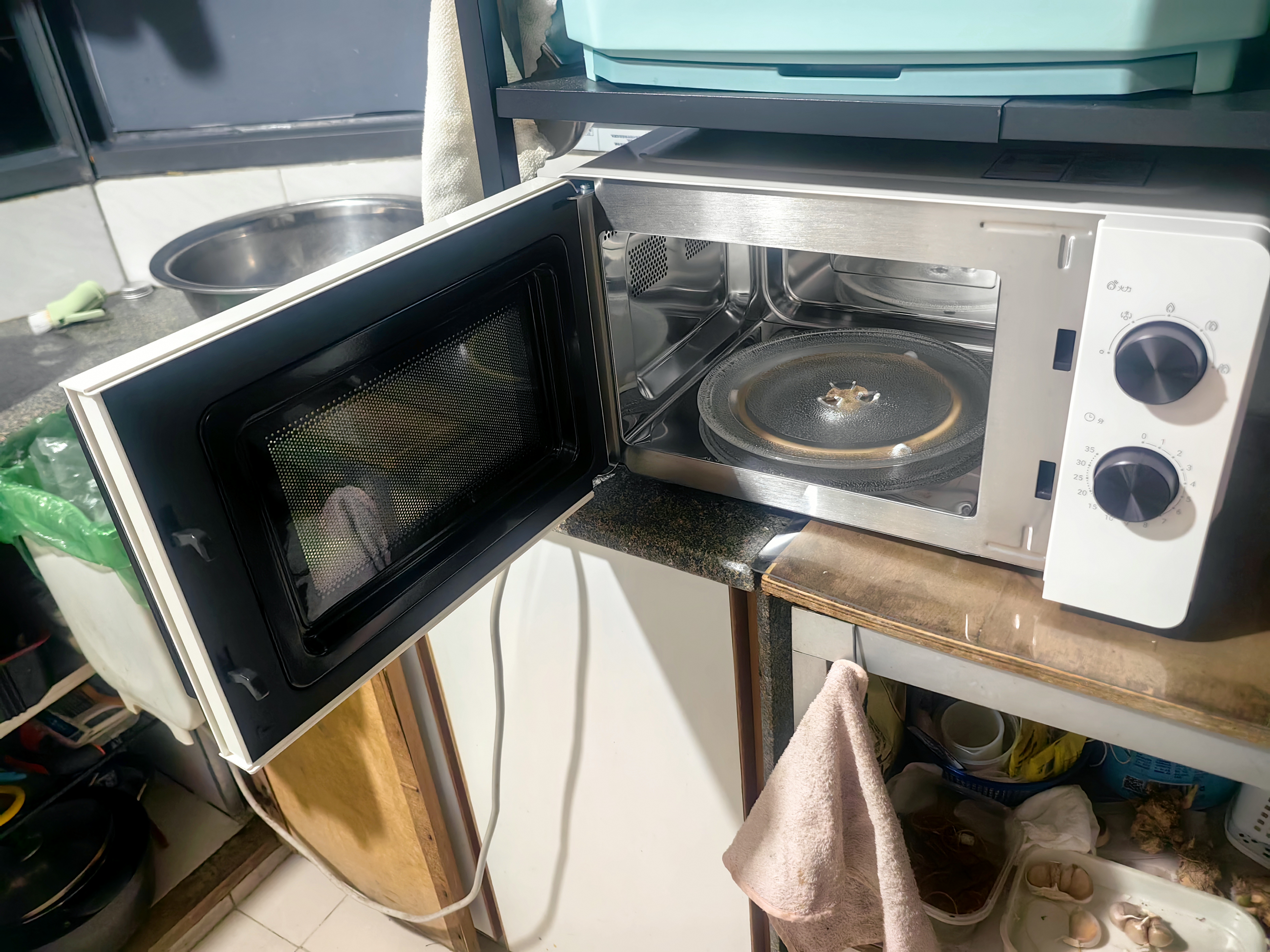 海尔（Haier）白巧不锈钢微波炉 0涂层360°转盘加热 旋转操作易洁耐用内胆 家用小型 老人适用 HW-M2003JW 实拍图