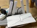 普联（TP-LINK）全屋路由器AX3000 子母路由分布式1母4子（独立包装）千兆无线双频大户型易展有线无线均可组网 实拍图