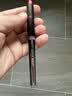 uni三菱【开学季】UB-205高科技走珠笔直液式 0.5mm太空抗压签字笔学生考试水笔防漏墨 蓝黑色 12支装 实拍图