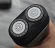 飞利浦【中秋礼物】新款自营男士电动剃须刀鹅卵石便携款 0.0微米净剃黄金比例 极境黑 生日送男生父亲 实拍图