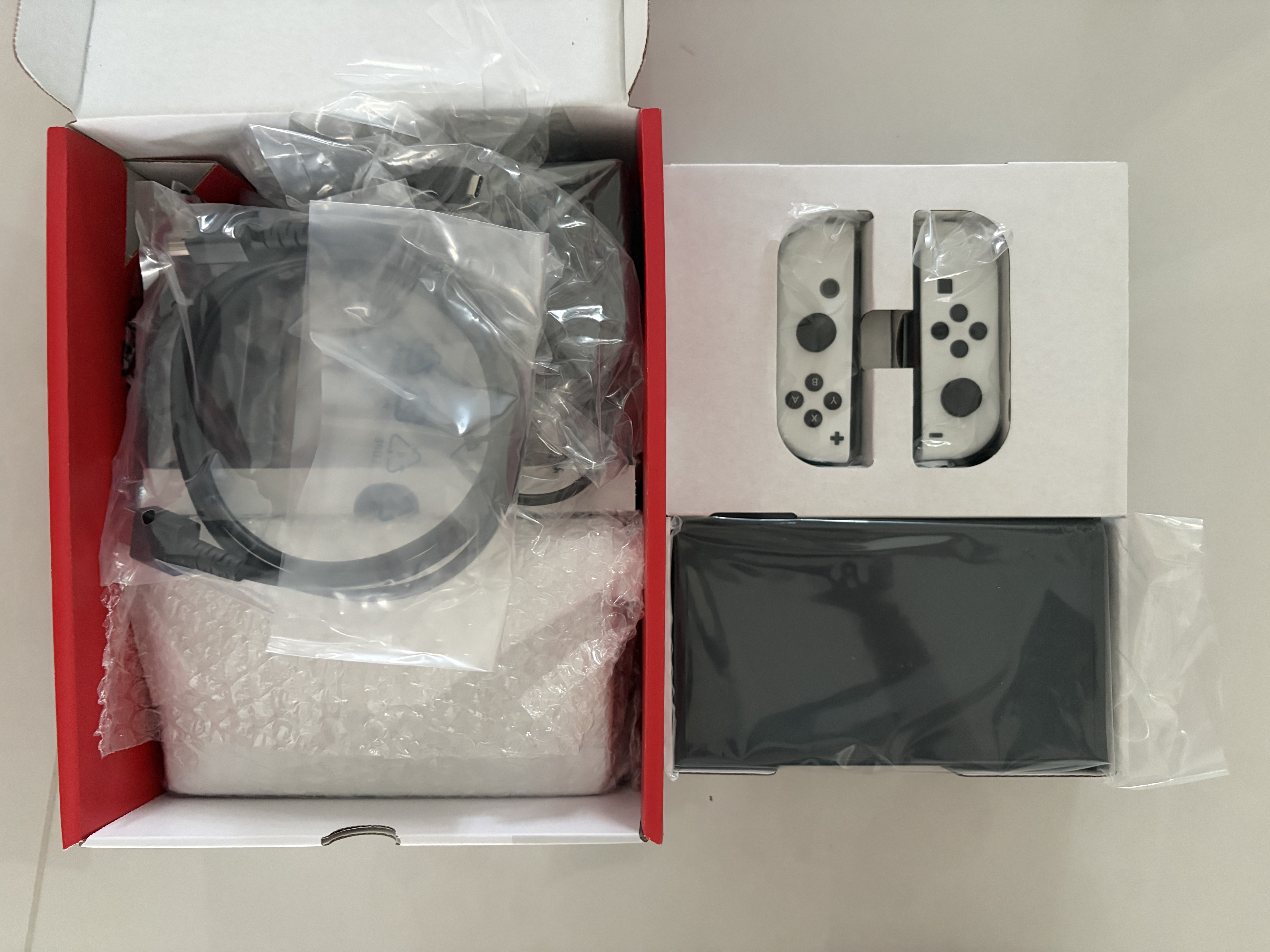 任天堂（Nintendo）【国内保税仓】Switch2/1代 OLED/续航加强日版/港版便携家用ns体感游戏机掌机 港版OLED白色64GB保税（赠共享会员） 实拍图