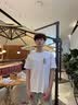 名创优品（MINISO）纯棉t恤男夏季2026新款衣服青少年亲肤透气休闲宽松大码潮流短袖 白色(生机胸标) L 175 (名创优品 品控严格) 实拍图