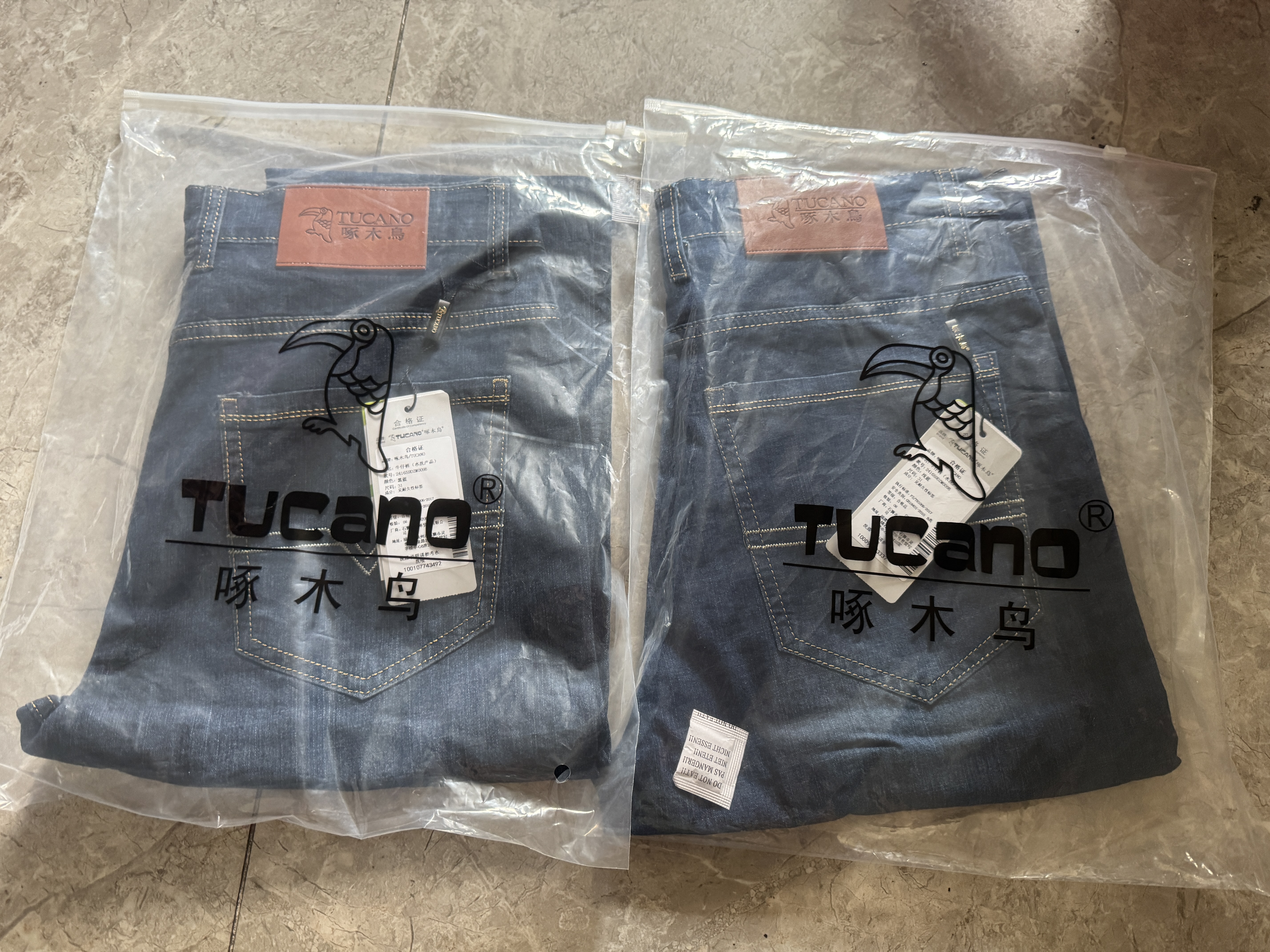 啄木鸟（TUCANO）牛仔裤男士夏季薄款纯色商务休闲抗皱弹力修身长裤子男装蓝色 31 实拍图