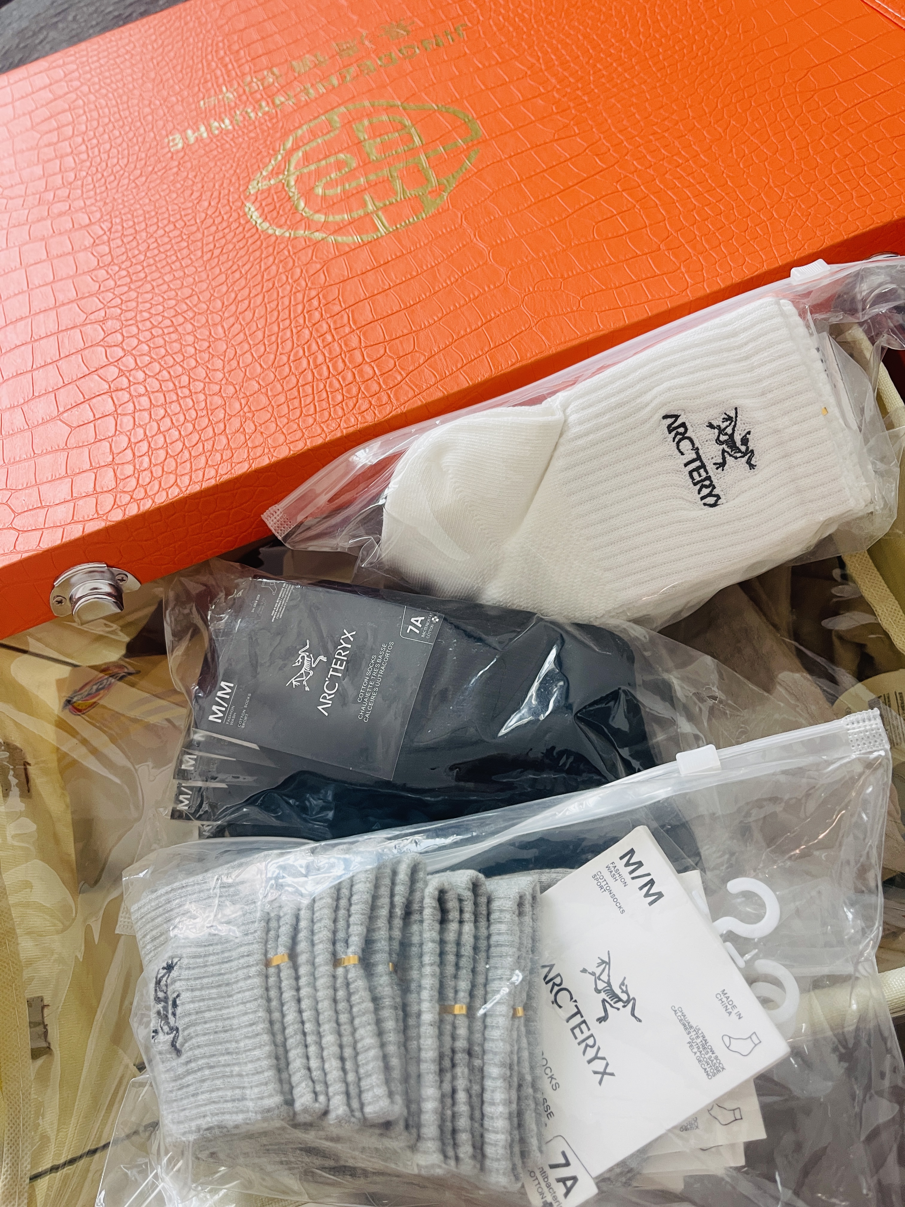 始祖鸟男女款中筒袜按摩底四季款纯色刺绣运动长筒袜透气同款长袜 5双黑色 M 男码 实拍图