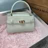 CHARLES&KEITH鳄鱼纹凯莉包手提斜挎婚包包女包生日礼物送女友CK2-50270880-1 Ivory象牙色 S 实拍图