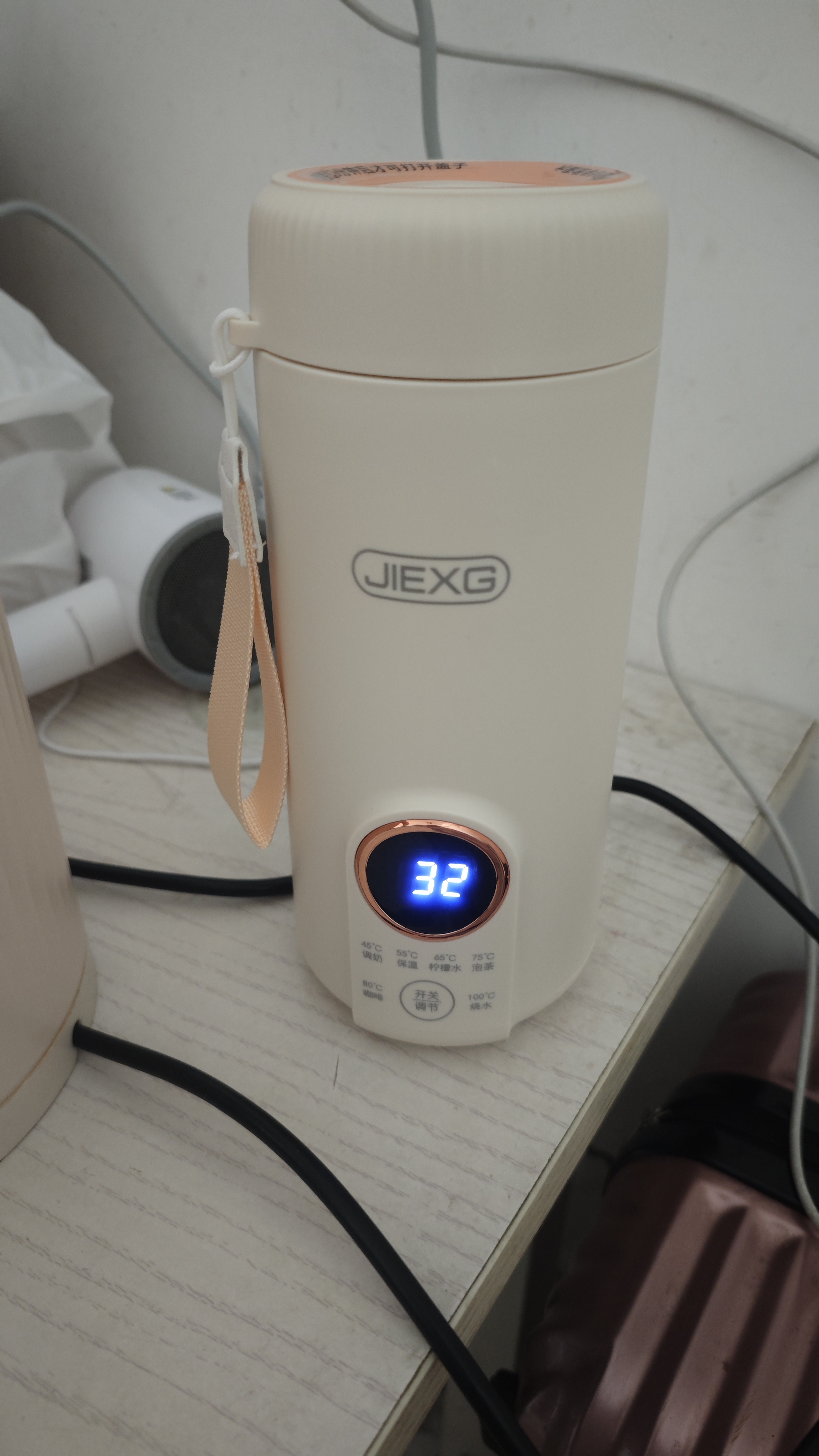 JIEXG德国电热水杯便携式烧水杯旅行家用宿舍小型迷你加热开水杯不锈钢内胆保温防烫电热烧水壶 0.6L 【升级600毫升】316内胆 实拍图