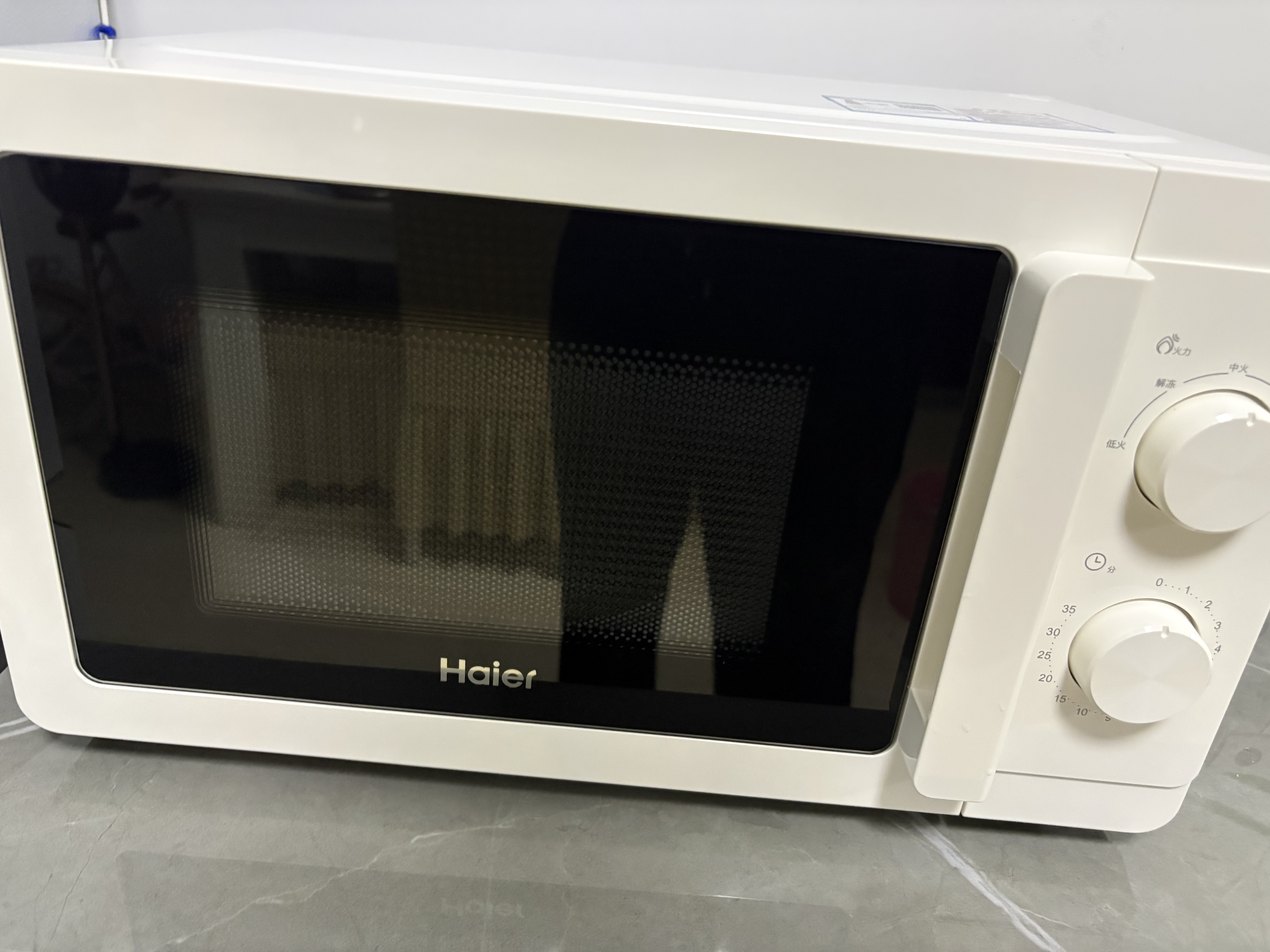 海尔（Haier）【金榜推荐】快捷微波炉 360°转盘加热 汉玉白旋转操作 易洁内胆 家用小型 老人适用 HW-M20T1W 实拍图