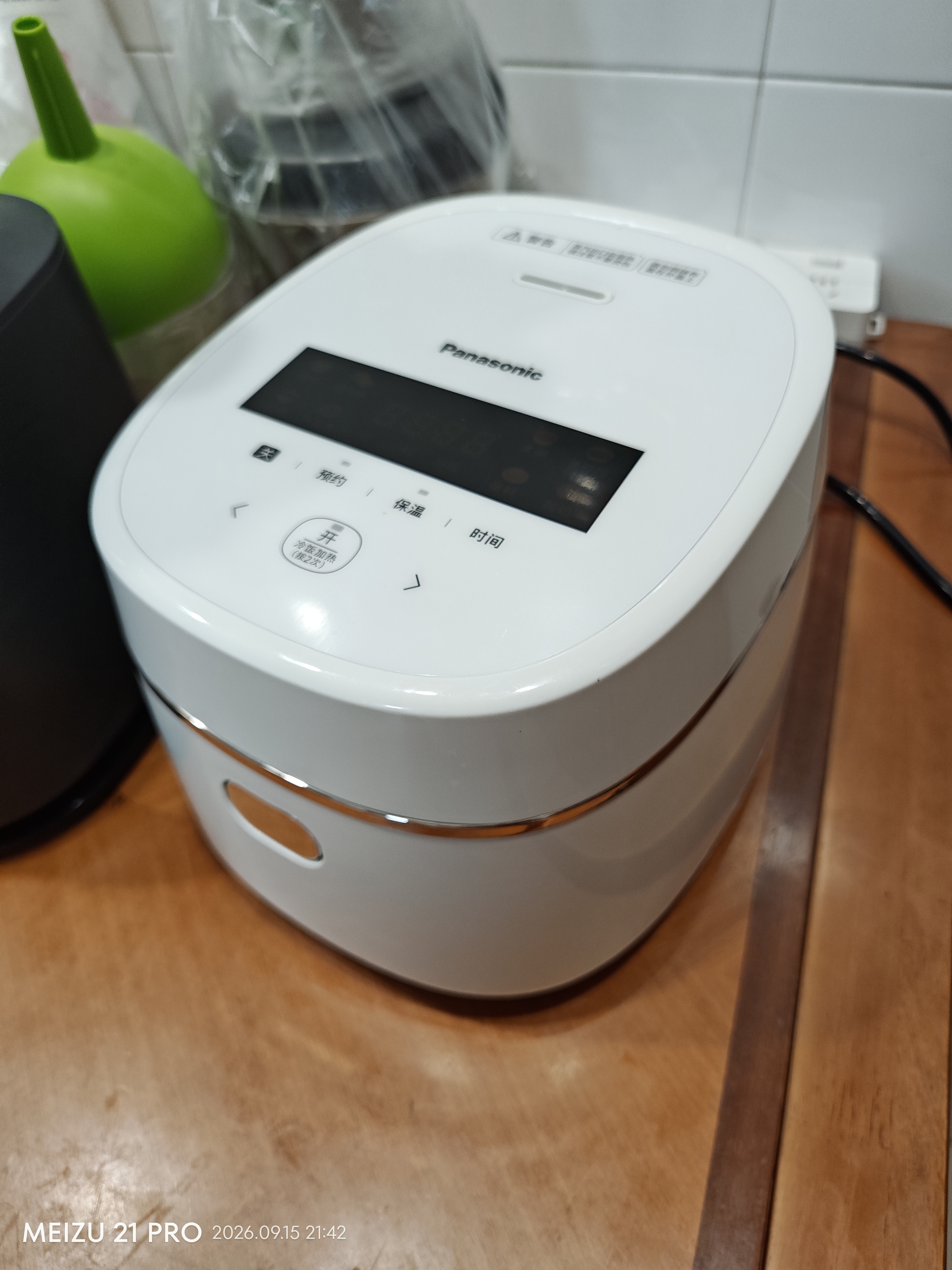 松下（Panasonic）小型电饭煲家用多功能电饭锅1-2人迷你智能煮饭锅预约定时焦脆煲仔饭1.5升容量DD051D 实拍图