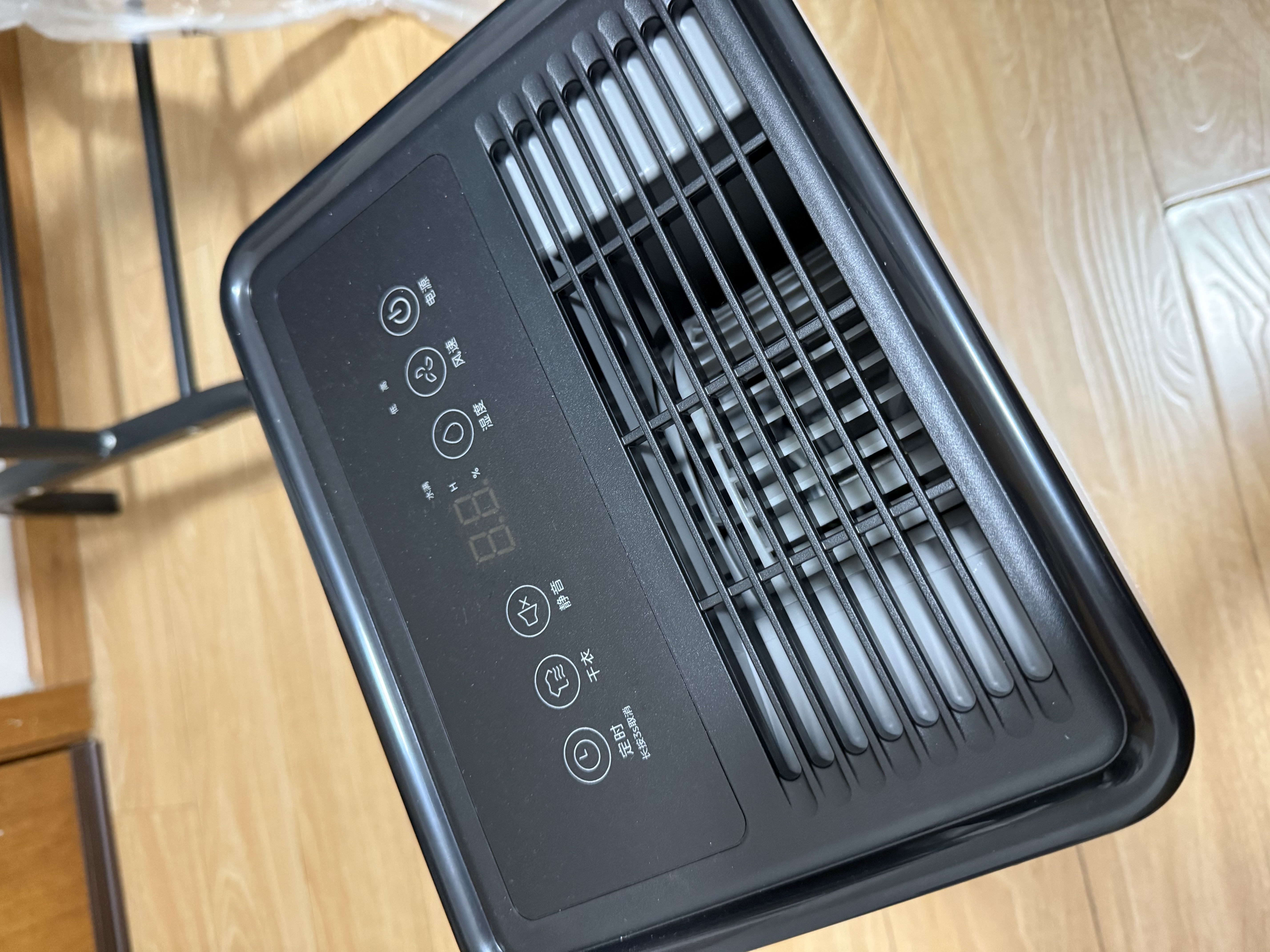 美的（Midea）除湿机/抽湿机12升/天 自营家用20㎡轻音小型回南天客厅卧室内防潮专用干衣吸湿器CF12BD/N7-DO 实拍图