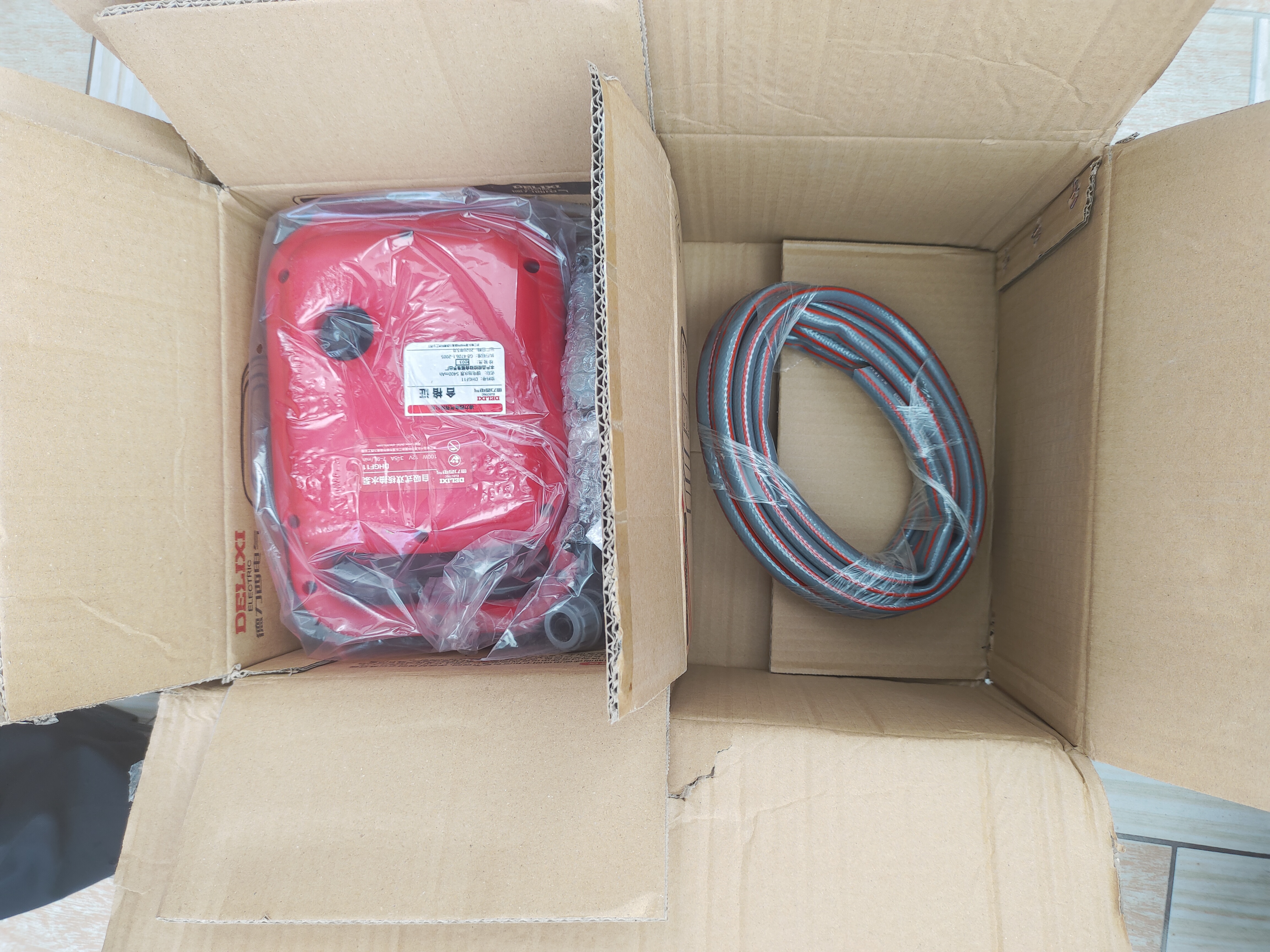 德力西电气（DELIXI ELECTRIC）充电式抽水泵浇菜神器浇水机农用菜地灌溉家用小型电动浇地抽水机 5300mAh双核+5+5米管 实拍图