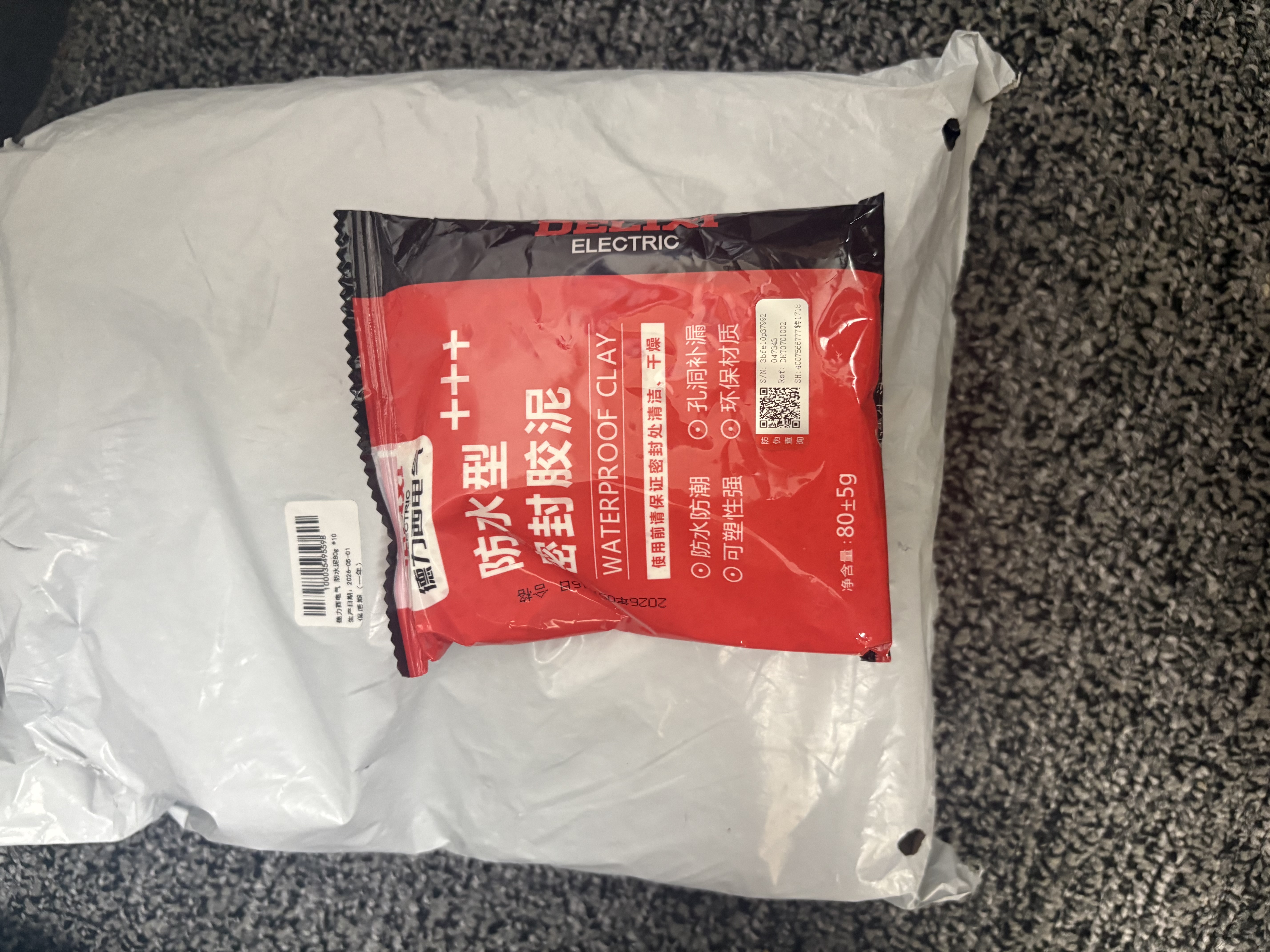德力西（DELIXI）防水泥密封胶泥堵管道下水道白色堵漏泥防虫防风墙洞孔填充10包装 实拍图