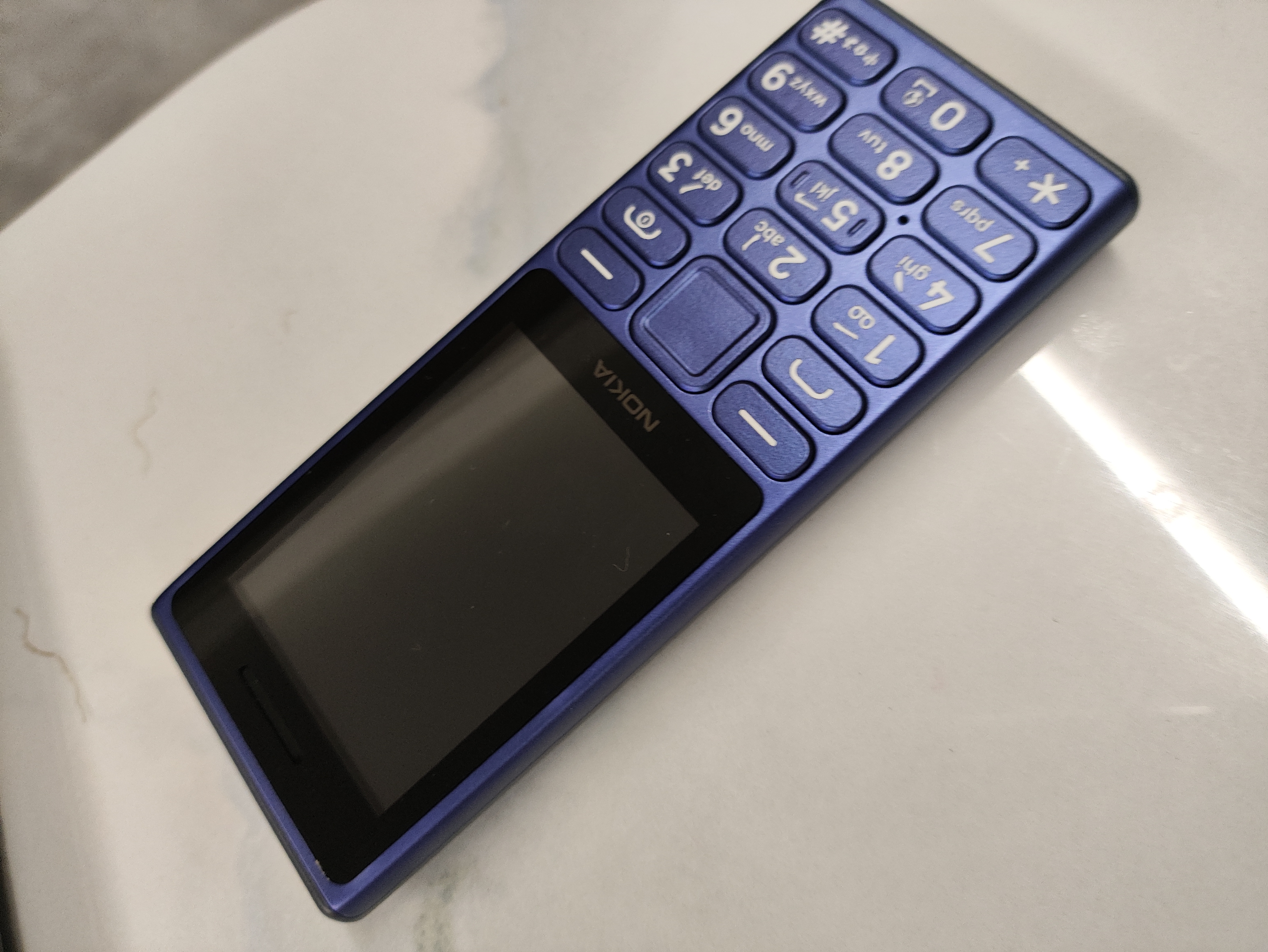 诺基亚（NOKIA）125 4G AI版全网通移动联通电信广电 2.4英寸 老人老年按键直板学生儿童备用手机 双卡双待 蓝色 实拍图