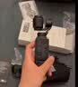 大疆 DJI Osmo Pocket 4 一英寸口袋云台相机 OP灵眸手持数码相机 旅游vlog便携美颜摄像 标准套装 官方标配 实拍图