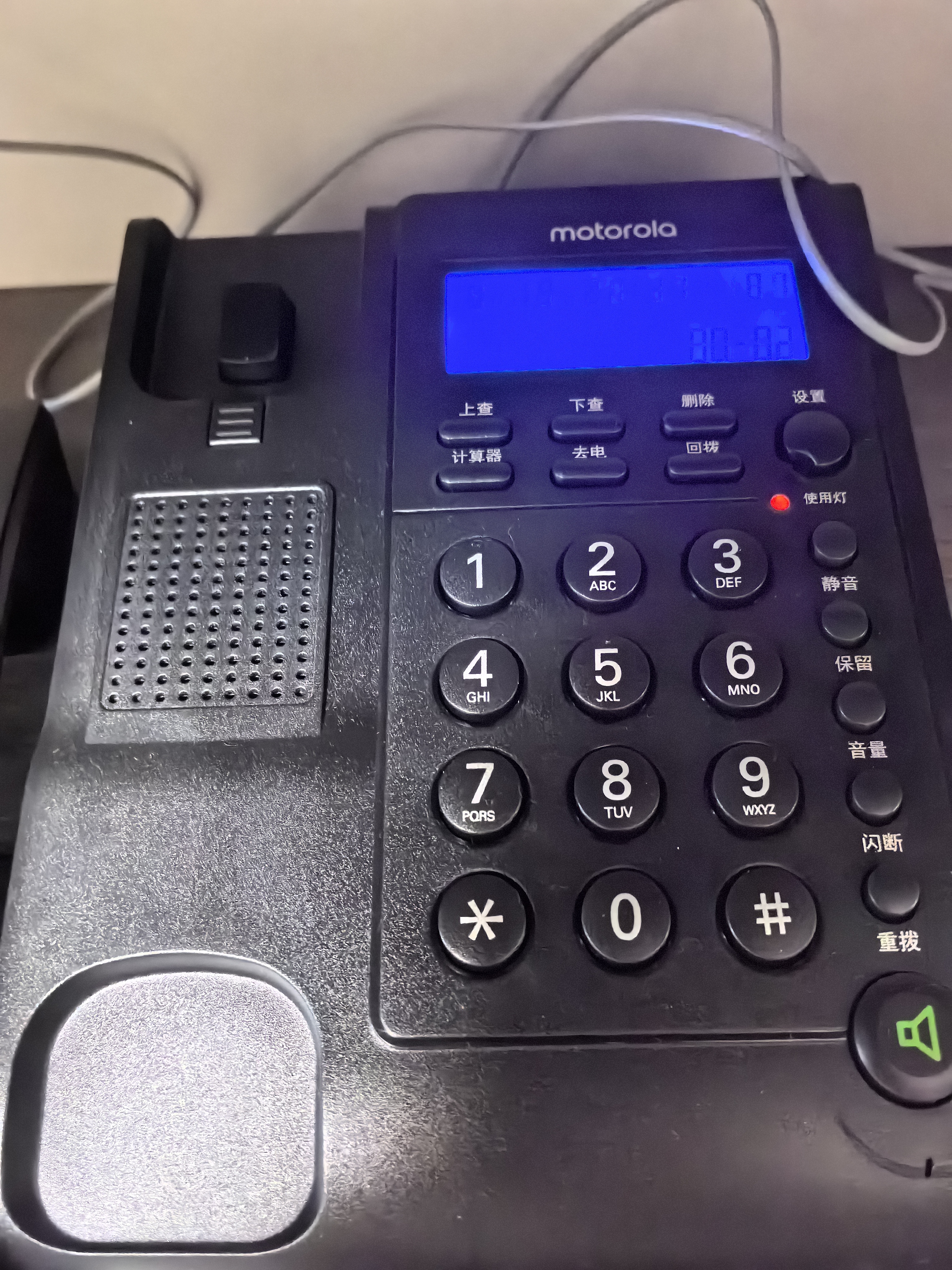 摩托罗拉（Motorola）电话机座机 蓝色背光 显示清晰 免提免打扰 桌墙两用 家用办公 有绳固定电话机 CT220黑色 实拍图
