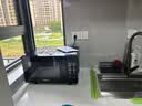 格兰仕（Galanz）变频微波炉烤箱一体机光波炉900瓦大功率速热家用23L大容量平板易清洁省电一级能效智能菜单烧烤 2026新升级彩膜BM1(S2) 实拍图