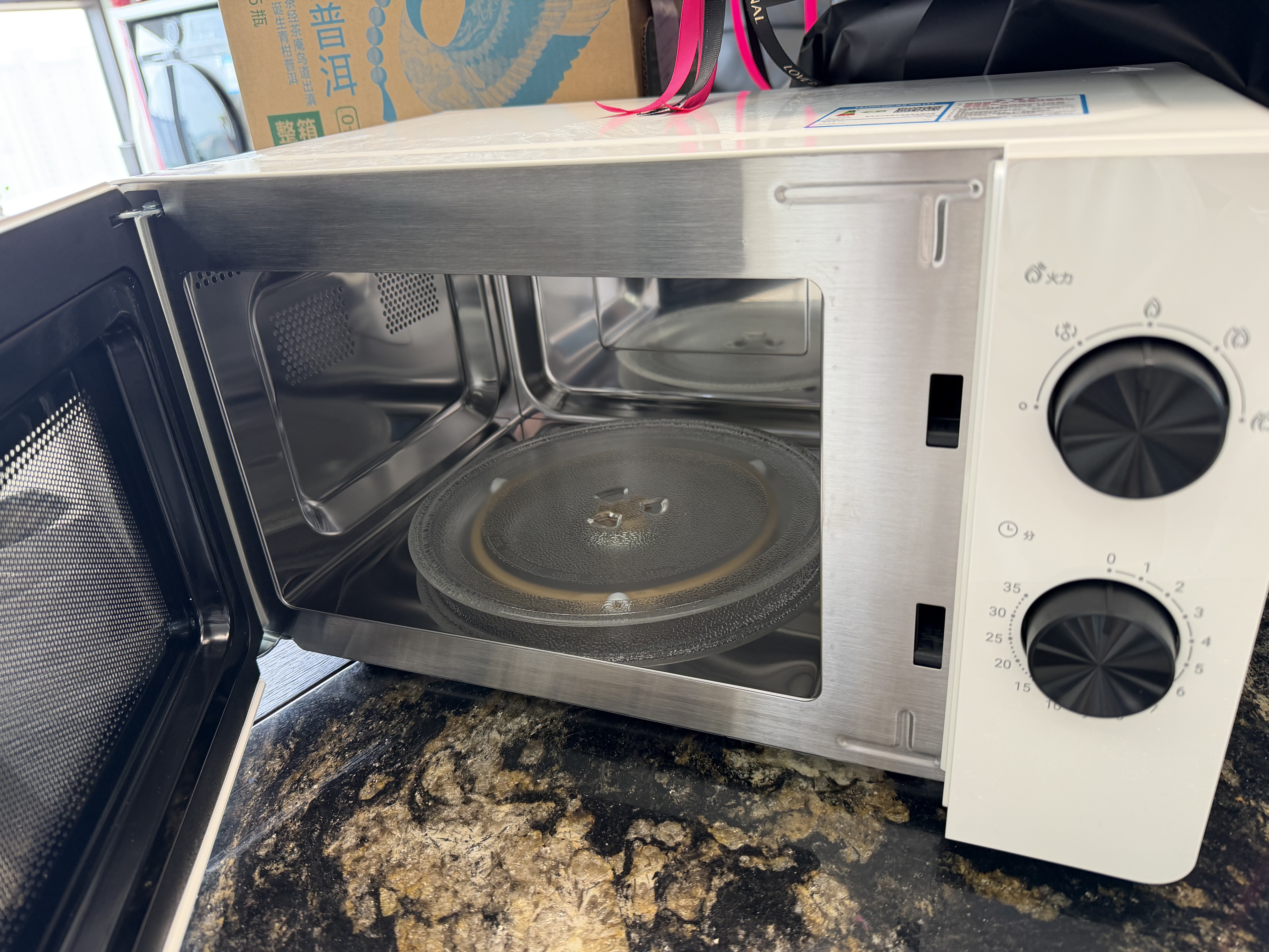 海尔（Haier）白巧不锈钢微波炉 0涂层360°转盘加热 旋转操作易洁耐用内胆 家用小型 老人适用 HW-M2003JW 实拍图