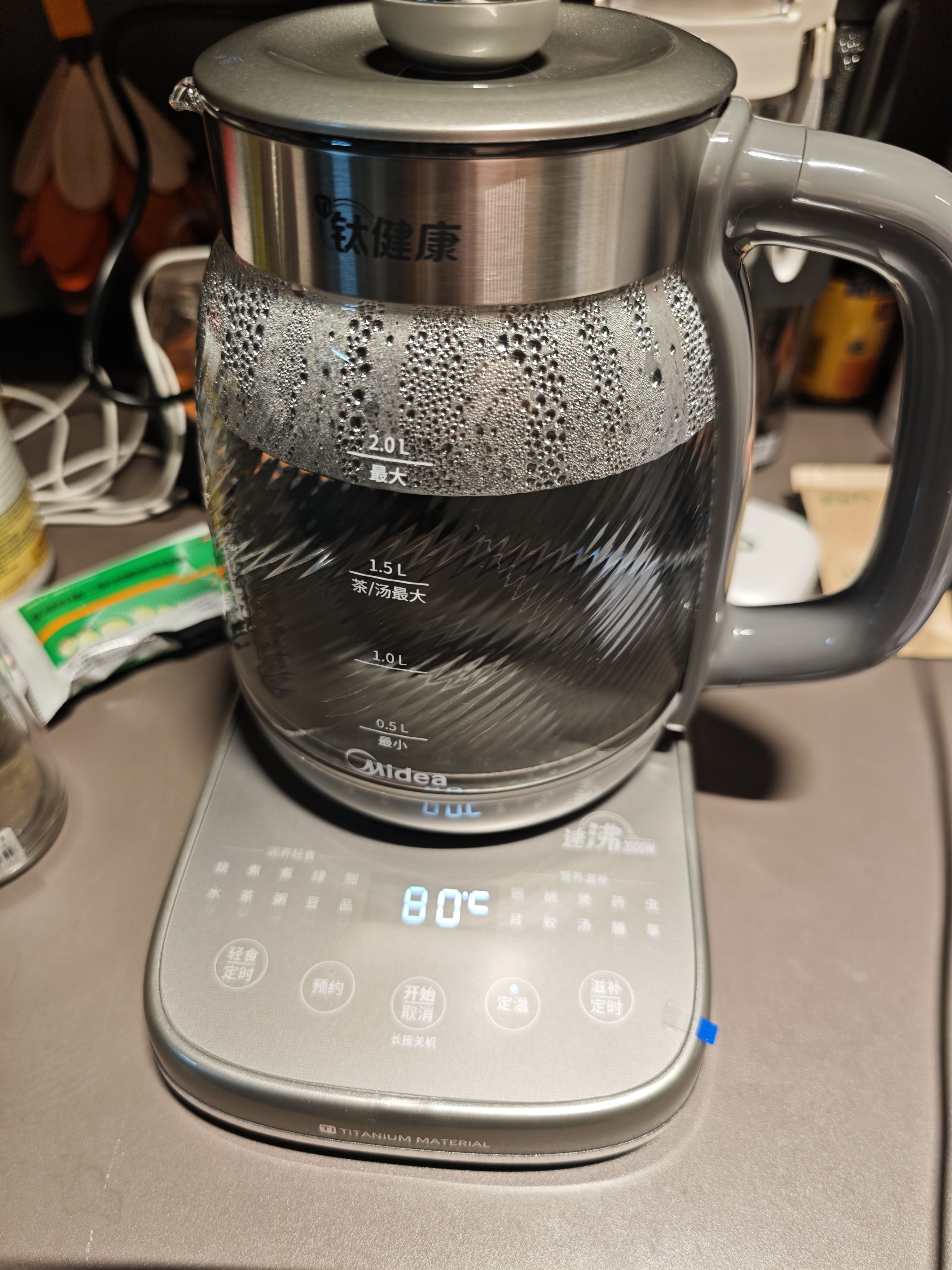 美的（Midea）纯钛养生壶烧水壶2L大容量全自动恒温水壶2000W速沸烧水+茶篮家用热水壶调奶器花茶壶YS20P705-Ti 实拍图