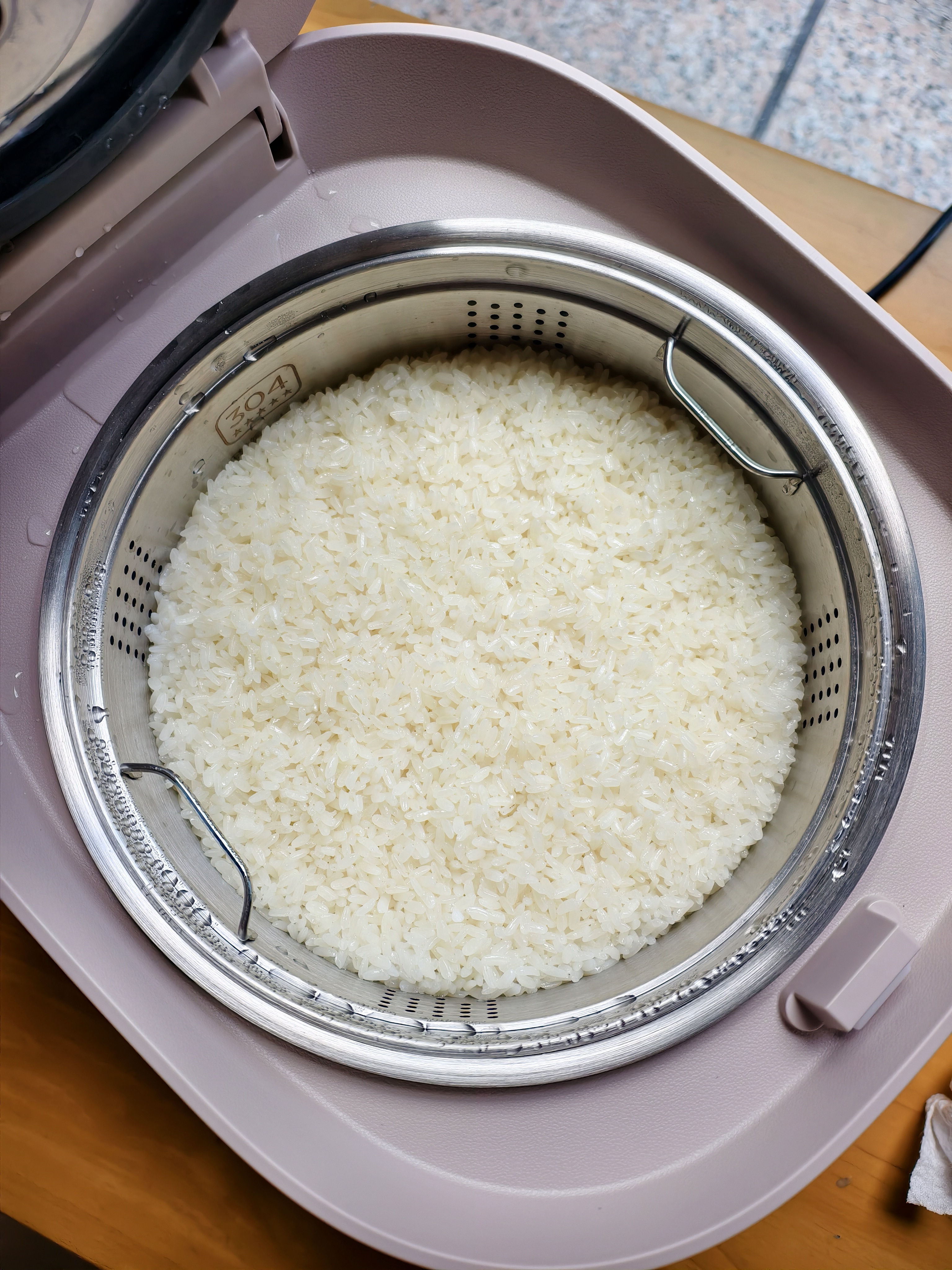 美的（Midea）低糖电饭煲 4升0涂层电饭锅家用智能米汤分离沥米饭煲316L不锈钢3-8人多功能微压蒸柴火饭锅4E62LS 实拍图